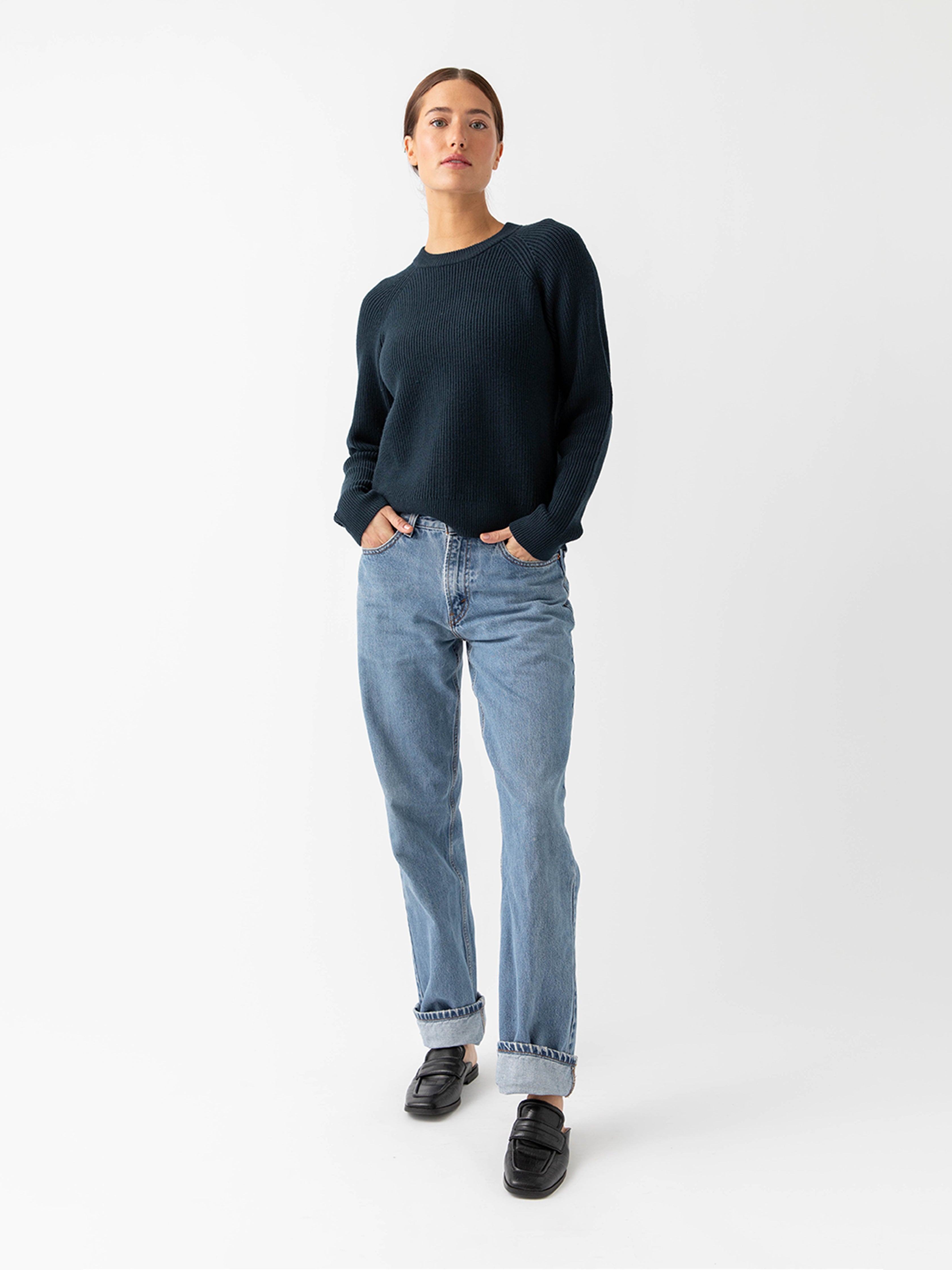 Woman wearing eclipse classic crewneck and jeans with white background |Color:Eclipse