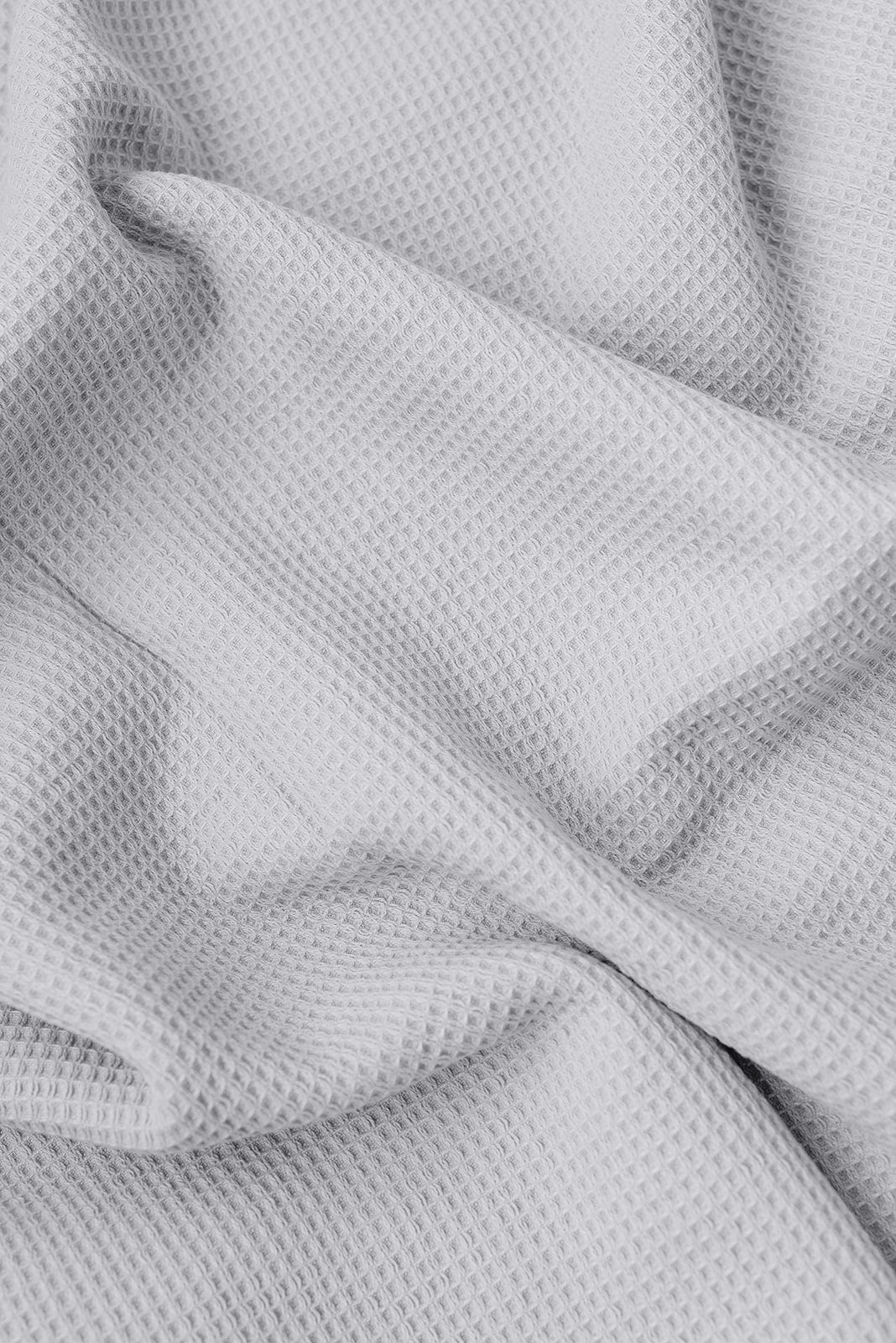 Waffle Bath Towel in the color Harbor Mist. Photo of Harbor Mist Waffle Bath Towel taken as a close up of the Waffle Bath Towel. The picture shows only the towel 