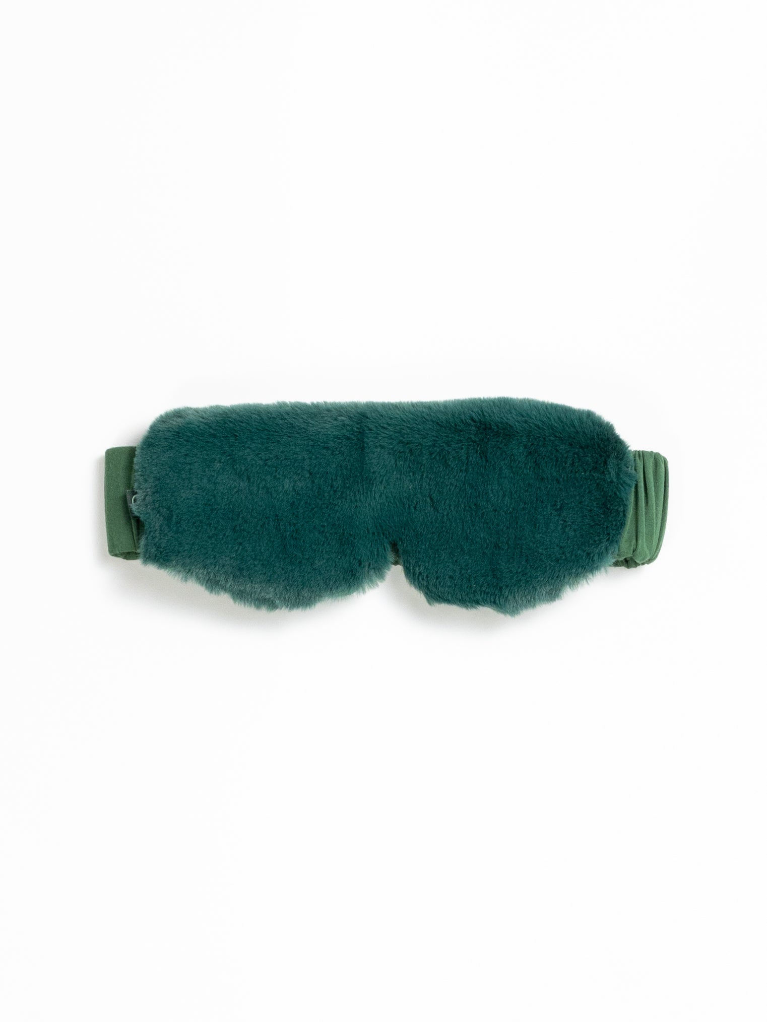 The Cozy Earth Faux Fur Sleep Mask in Jade is pictured on a white background. |Color:Jade 