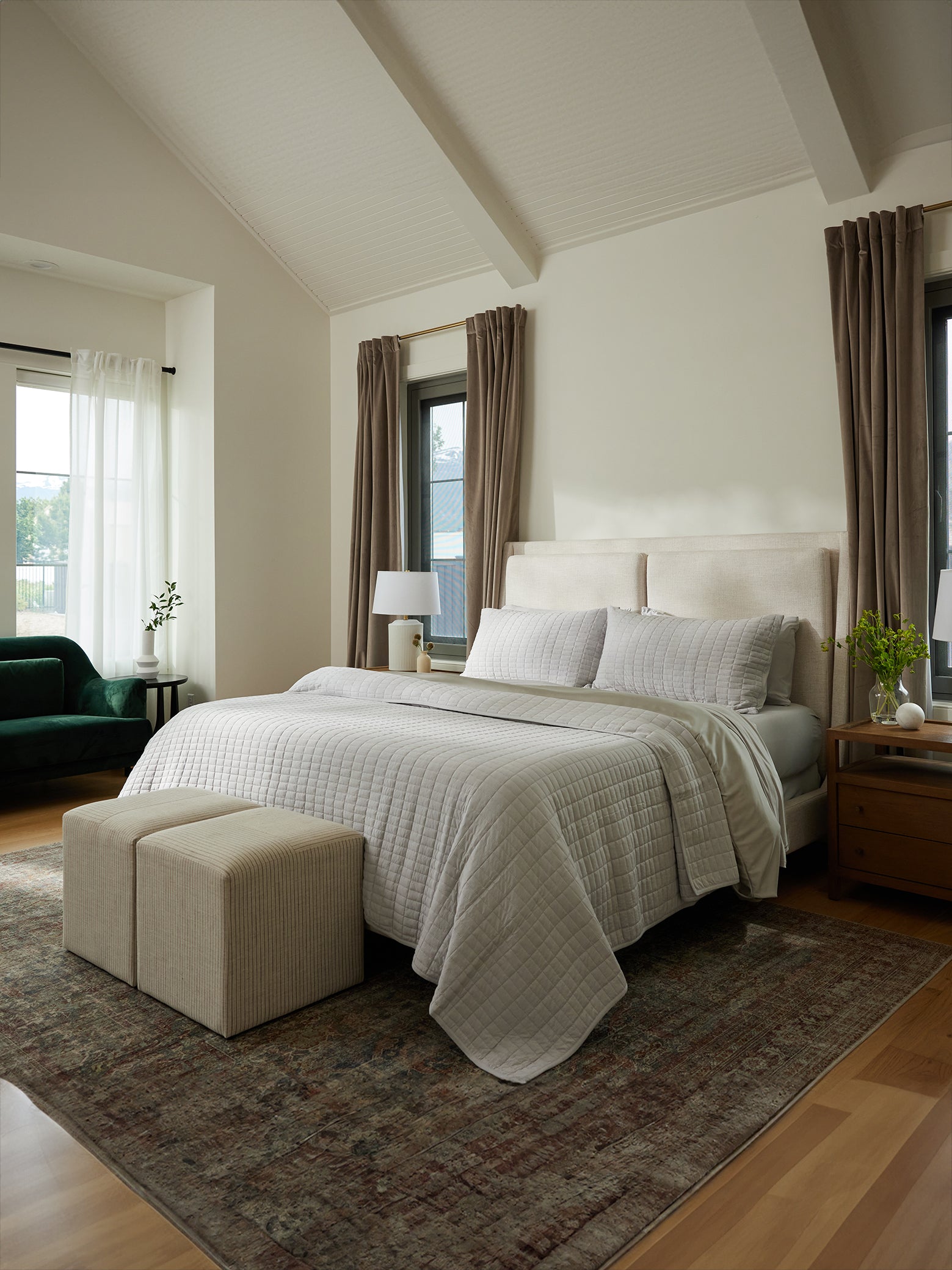 Zoomed out image of bed made with light grey bamboo jersey bedding and quilt |Color:Light Grey