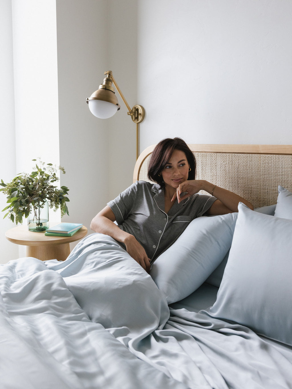 women in pajamas in bed