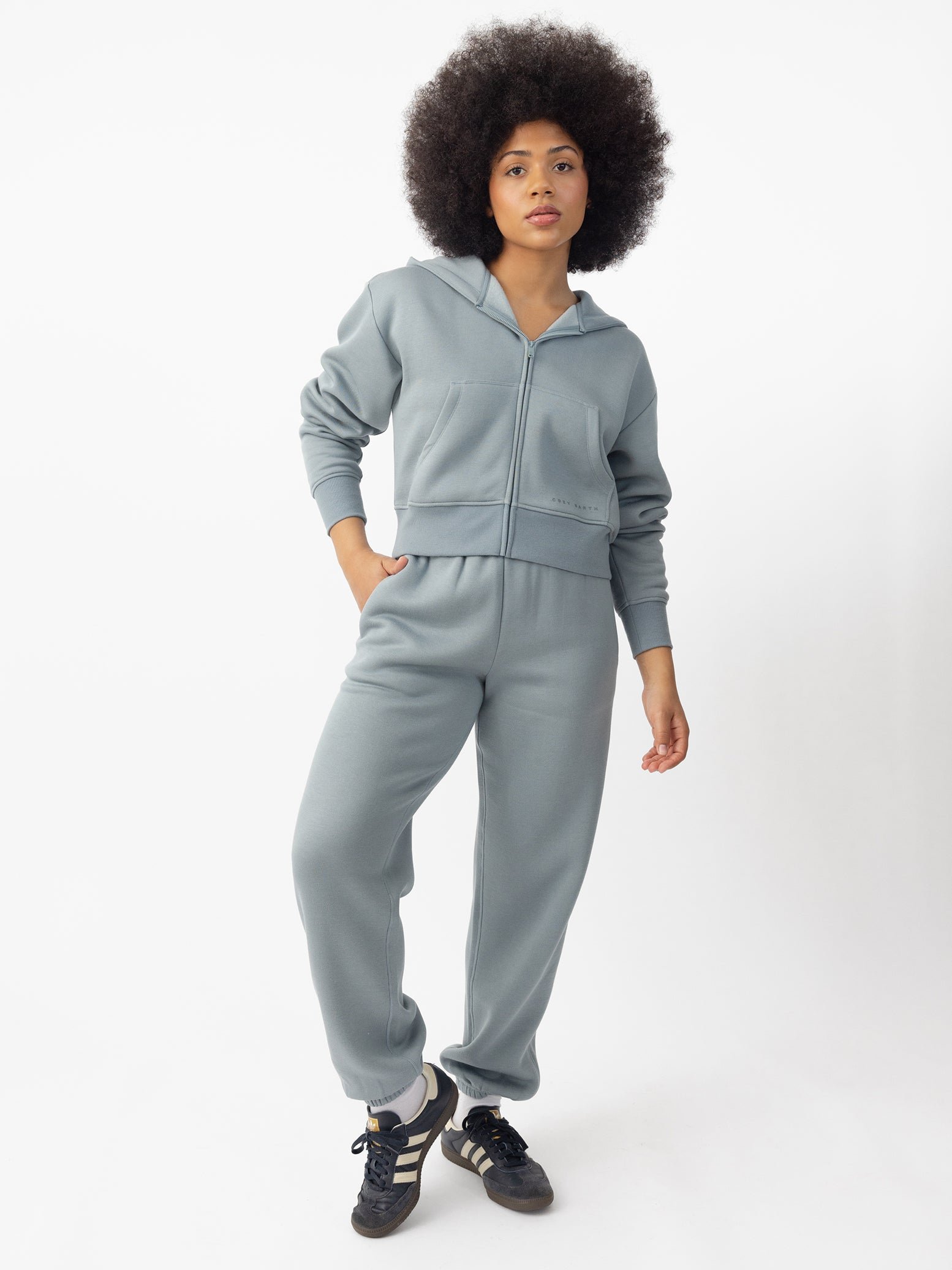 Woman wearing Smokey Blue CityScape Sweat Pant with white background 