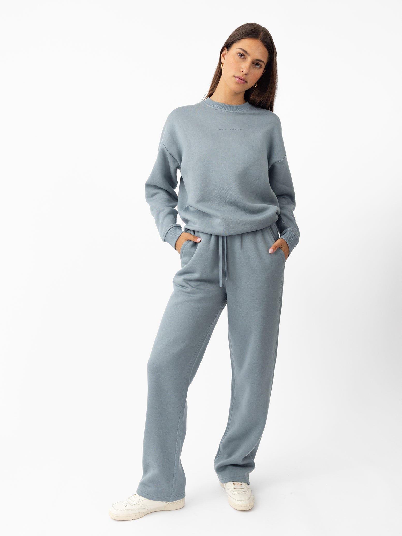 Woman wearing Smokey Blue CityScape Crewneck with white background 