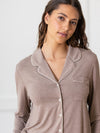 Walnut Long Sleeve Pajama Set modeled by a woman. The photo was taken in a light setting, showing off the colors and lines of the pajamas. |Color:Walnut