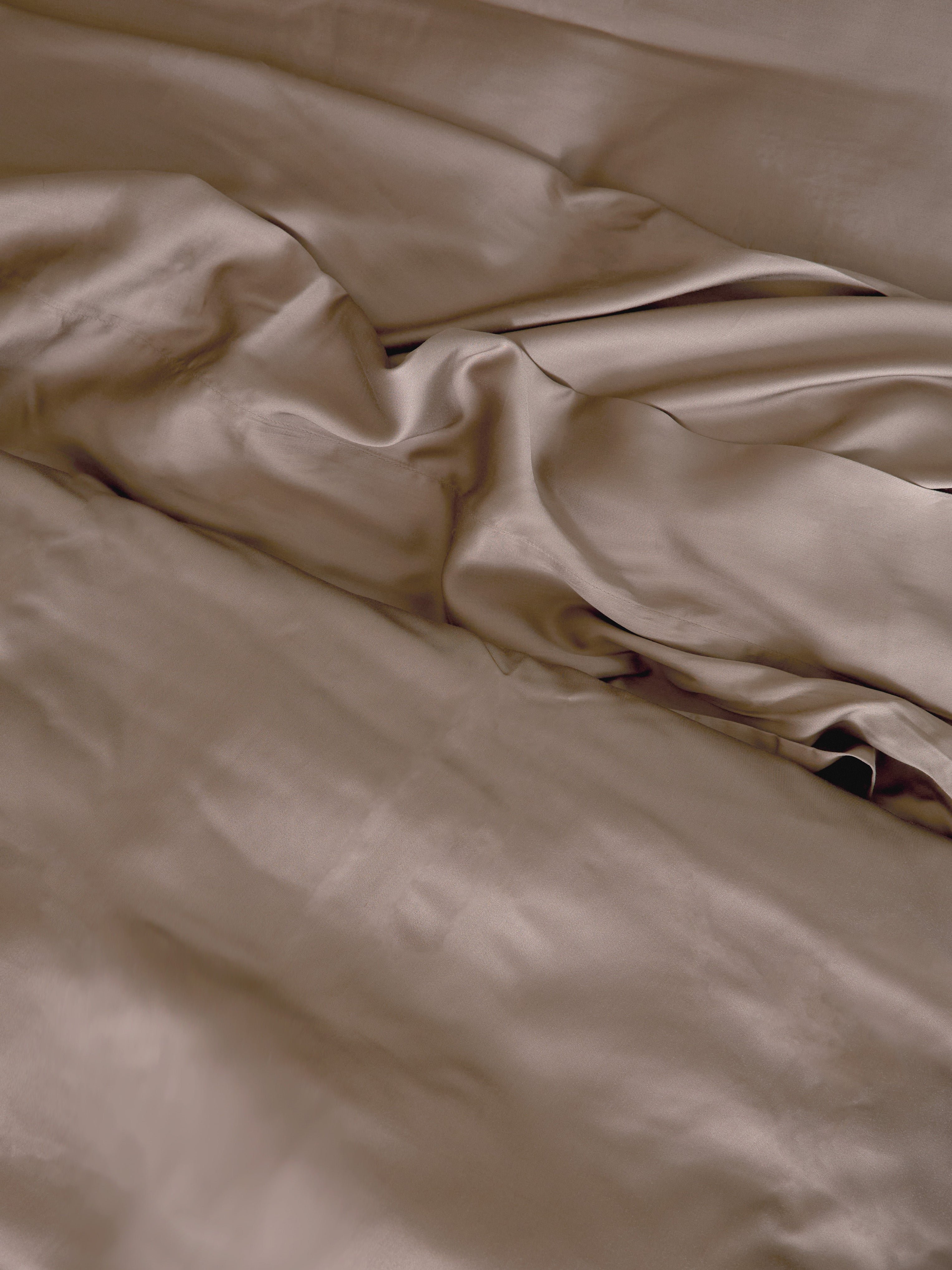 Close up of walnut bedding on bed 