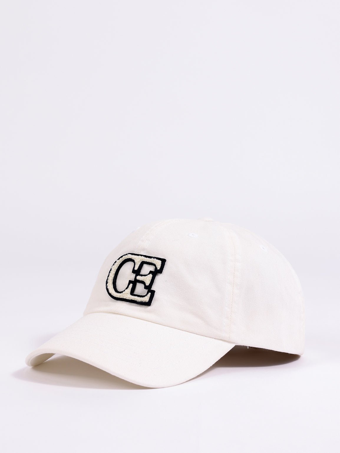 Side view of washed cream vintage cap