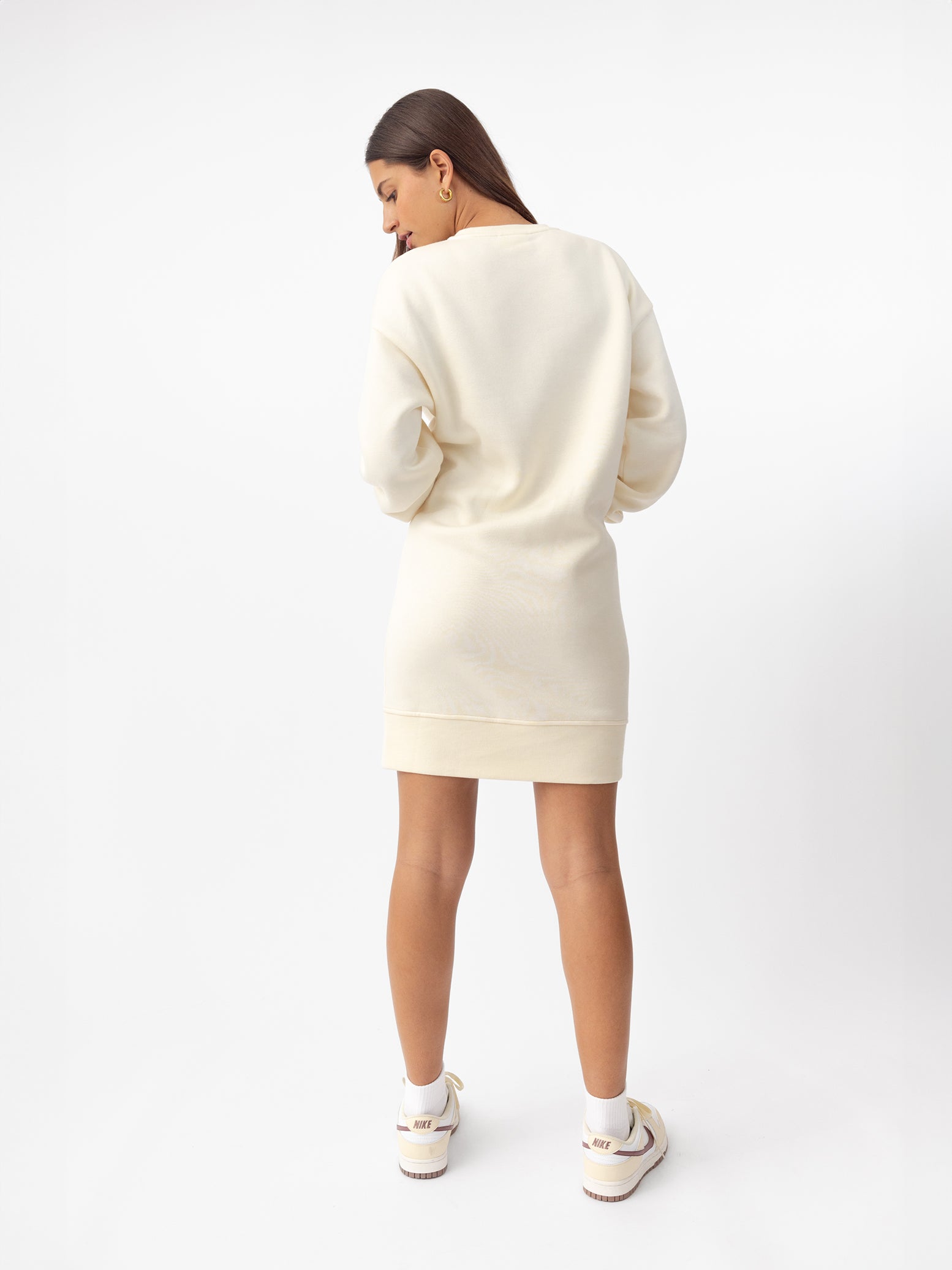 Woman wearing Alabaster CityScape Crewneck Dress with white background |Color: Alabaster