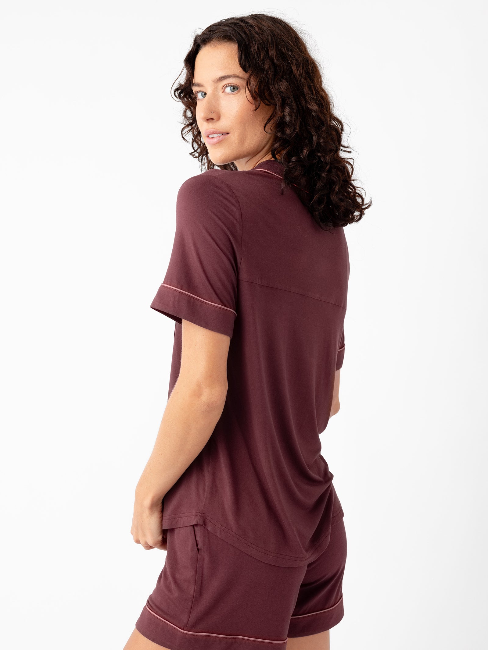 Woman wearing Women's Short Sleeve Bamboo Pajama Top in Stretch-Knit - Burgundy 