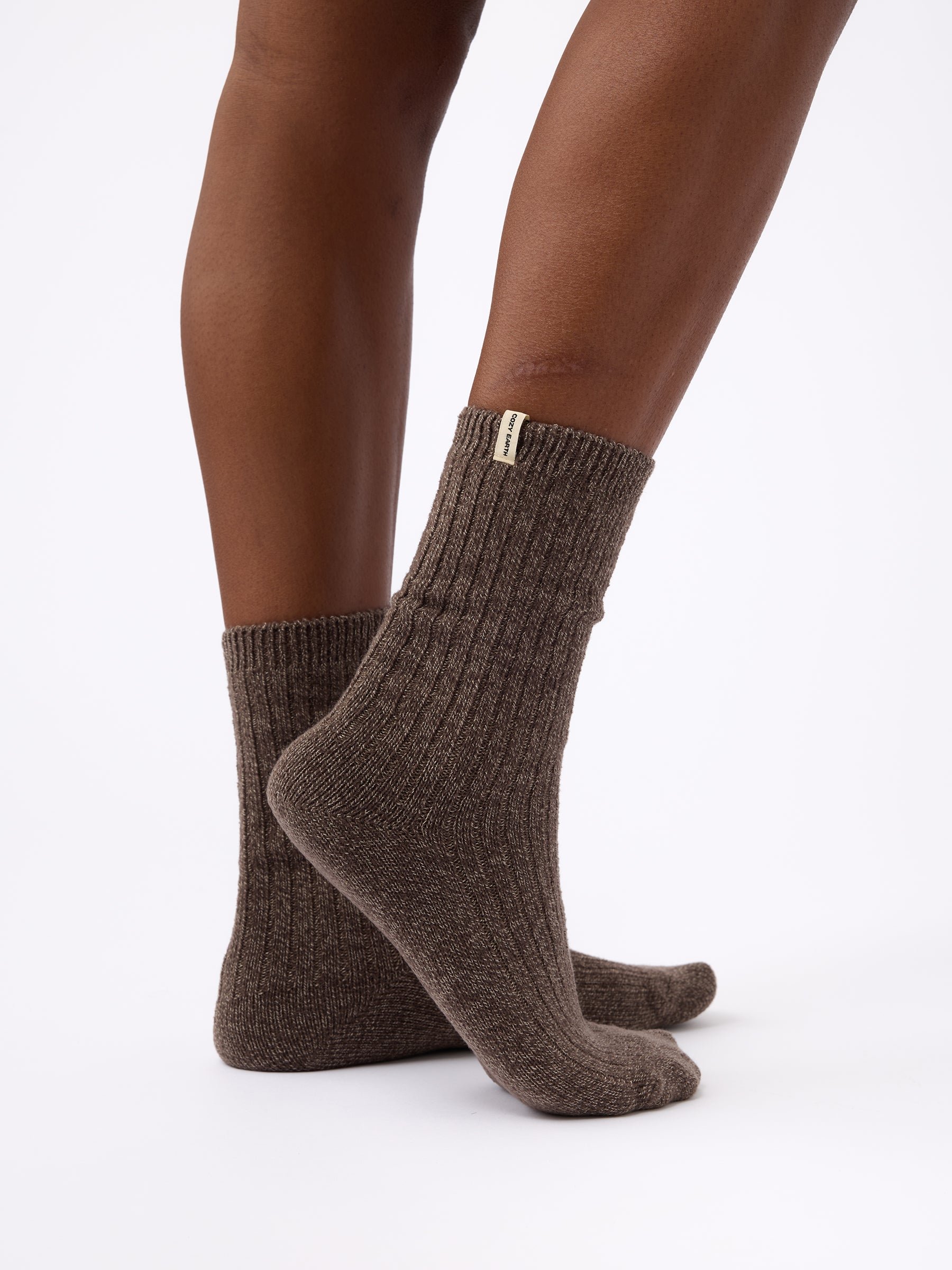Person wearing Cozy Earth Plush Lounge Sock in Cacao 
