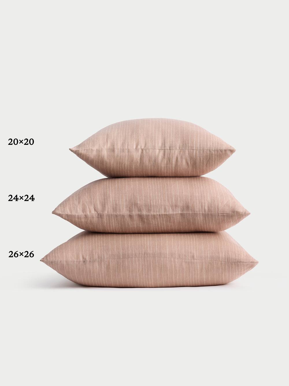 Cozy Earth striped throw pillow with plain white background 