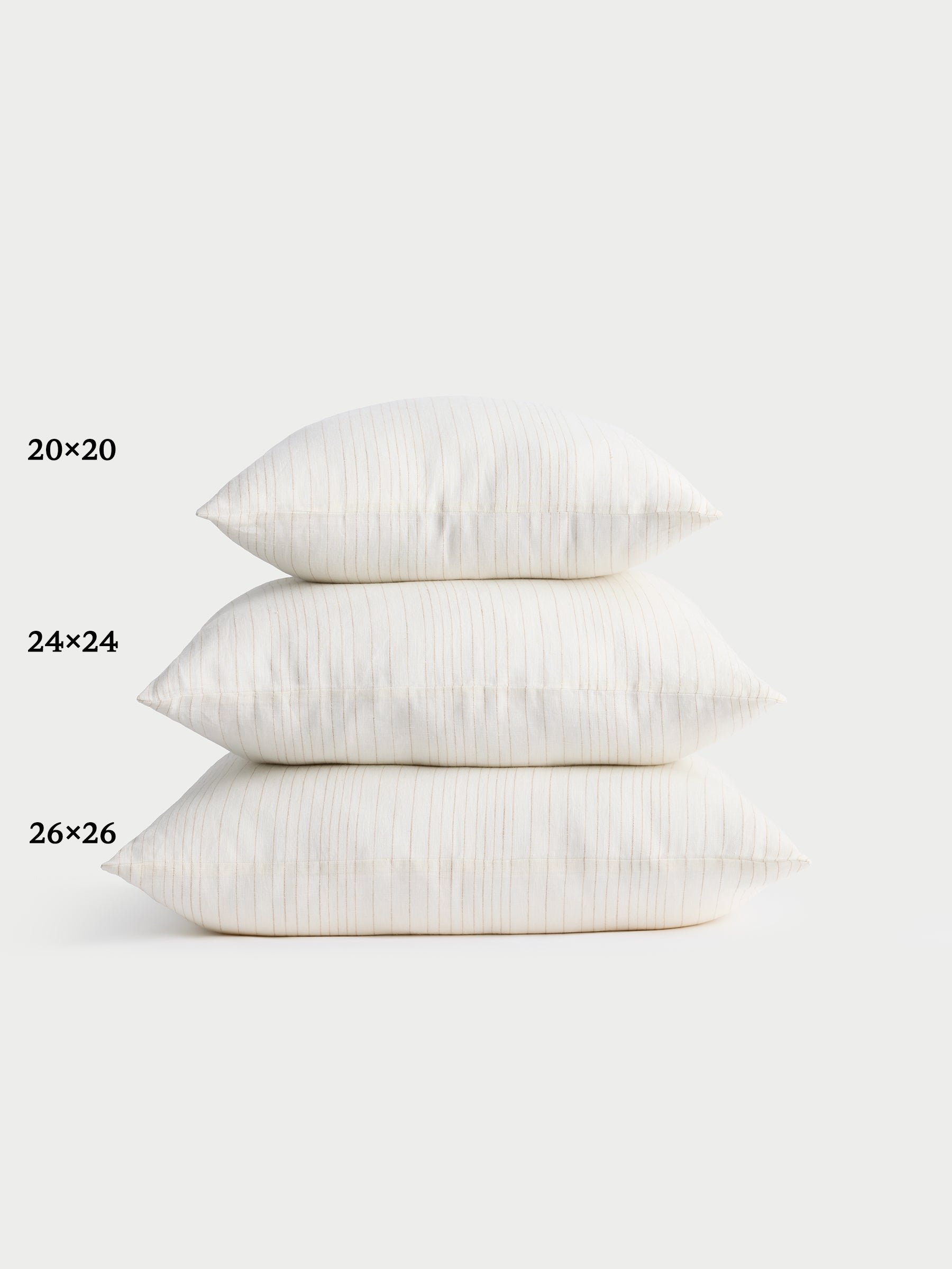Cozy Earth striped throw pillow with plain white background 