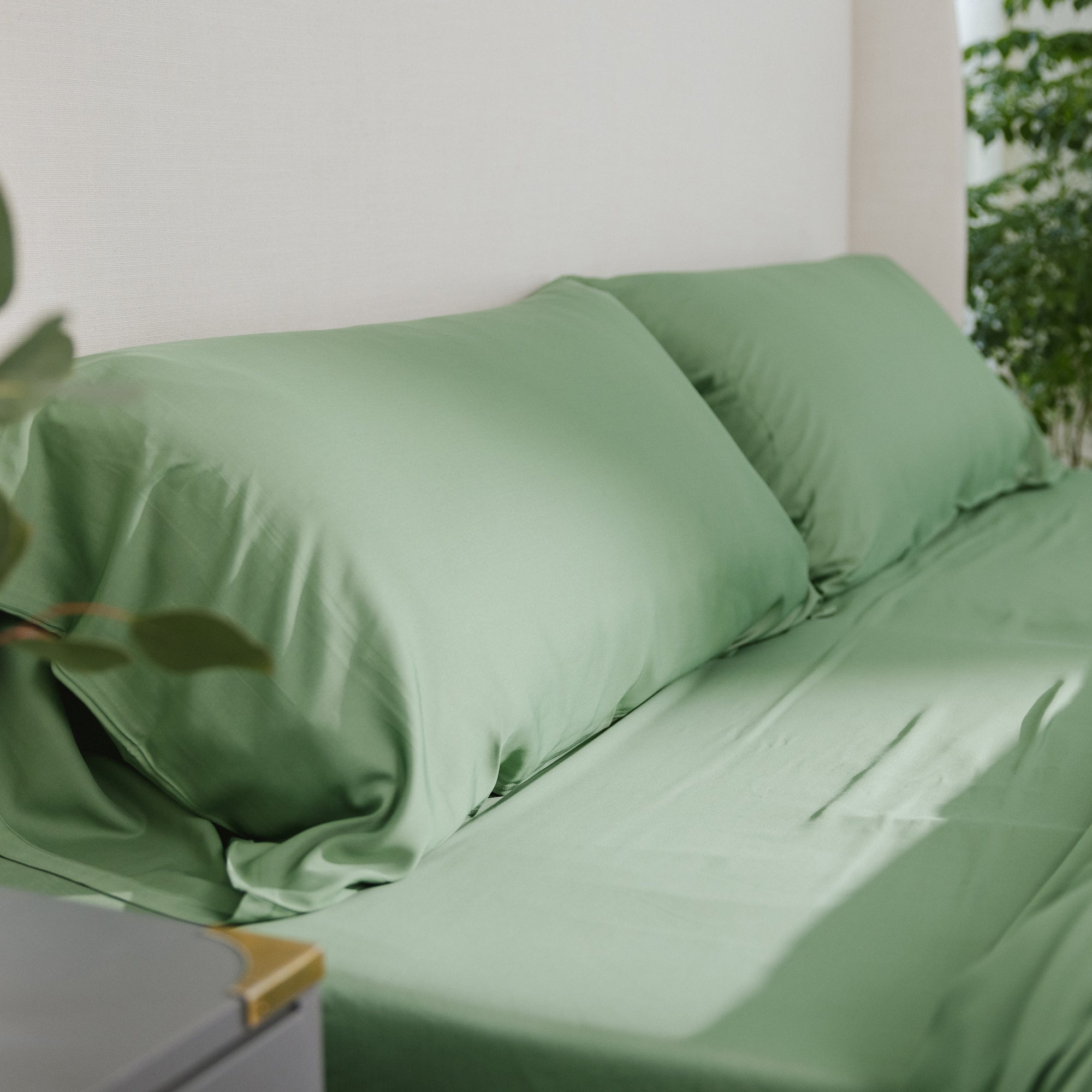 Fern Pillowcases on bed. Photo taken close up standard/king. 