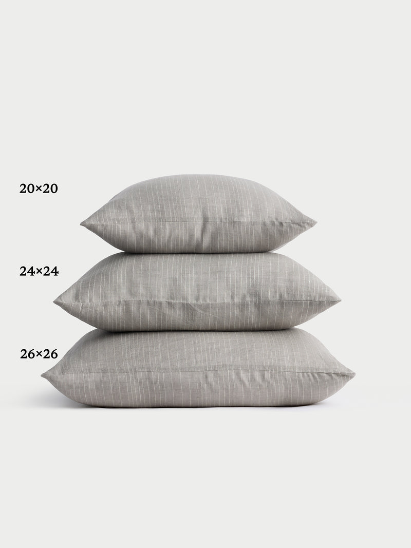 Cozy Earth striped throw pillow with plain white background