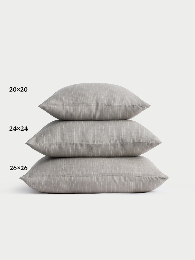 Cozy Earth striped throw pillow with plain white background