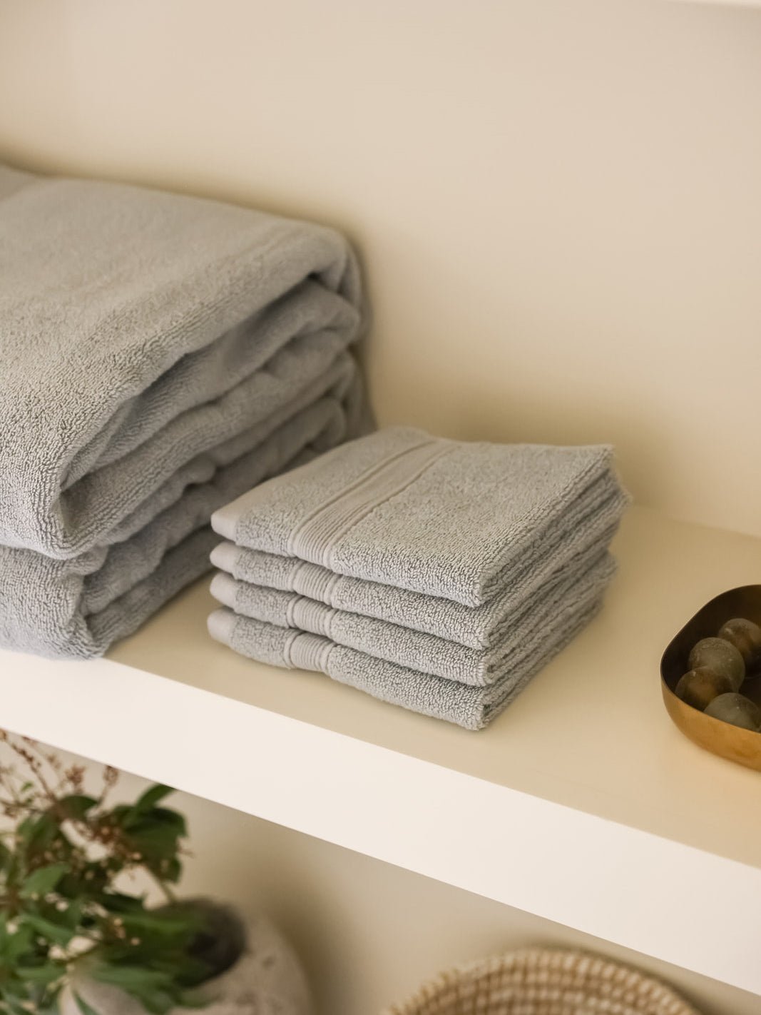 Harbor mist washcloths folded on shelf 