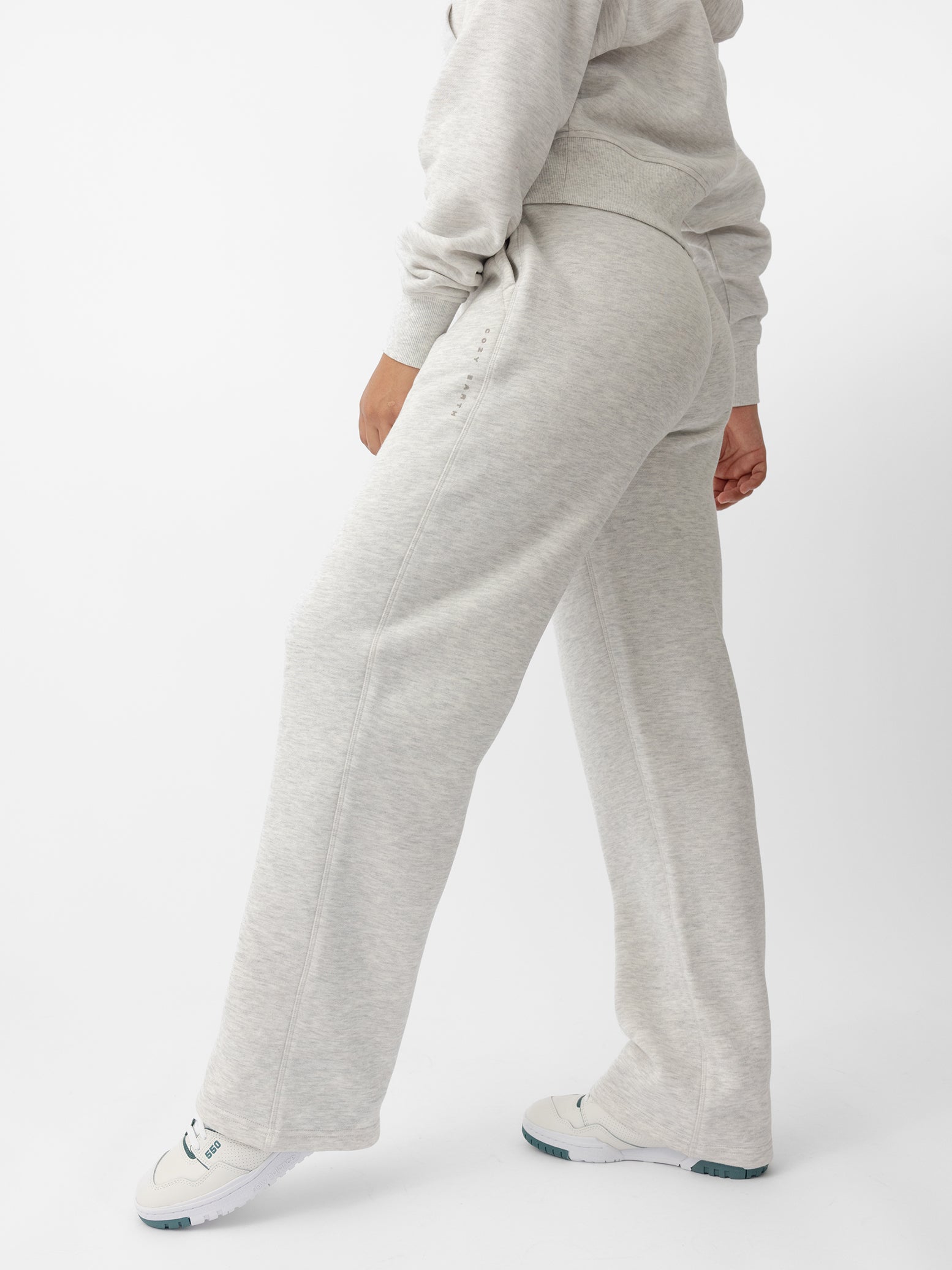 Woman wearing Heather Grey CityScape Wide Leg Pant with white background |Color: Heather Grey