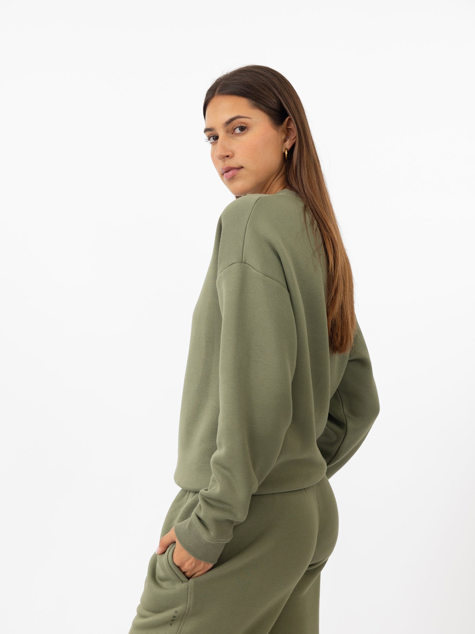 Woman wearing Juniper CityScape Crewneck with white background 