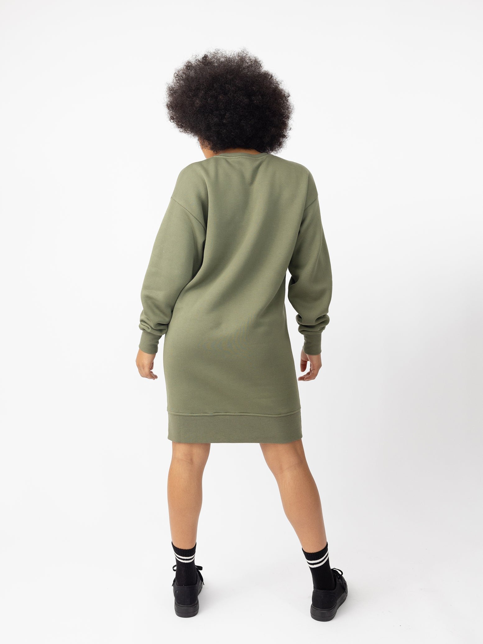 Woman wearing Juniper CityScape Crewneck Dress with white background 