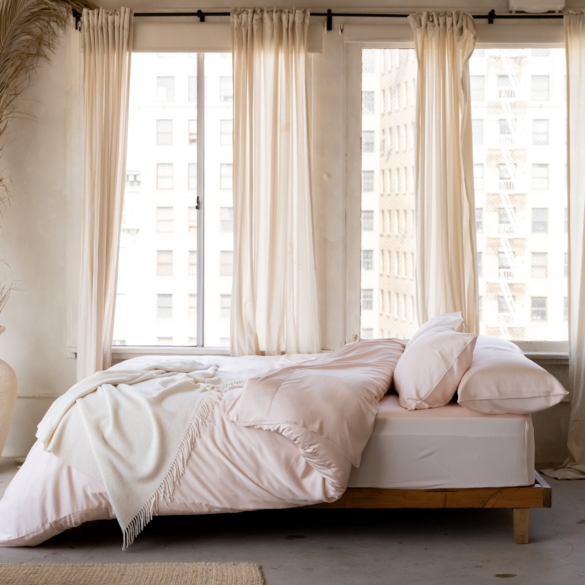 City bedroom zoomed out with bed with peony bedding 