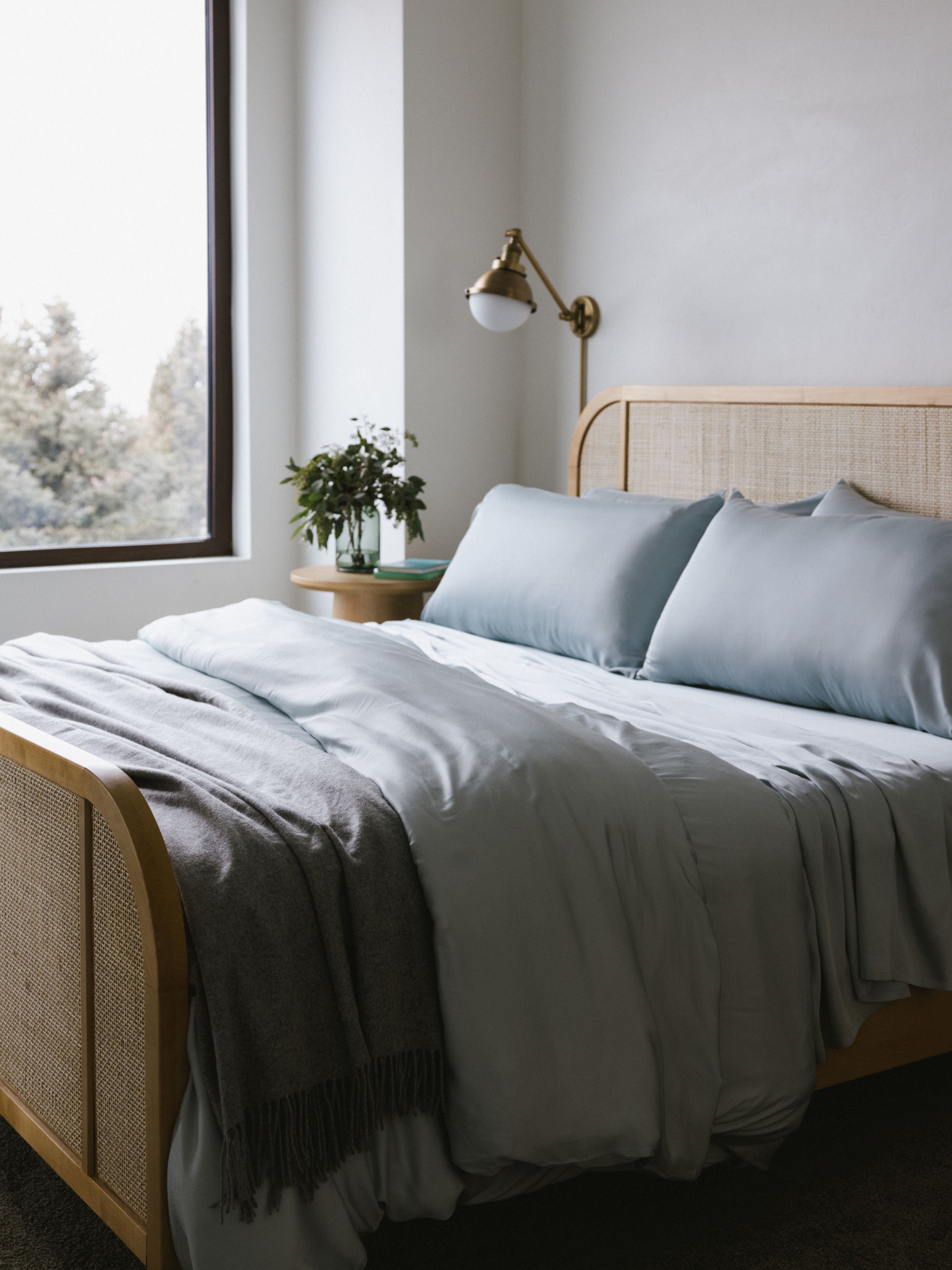 Zoomed out image of whole bed with shore bedding 
