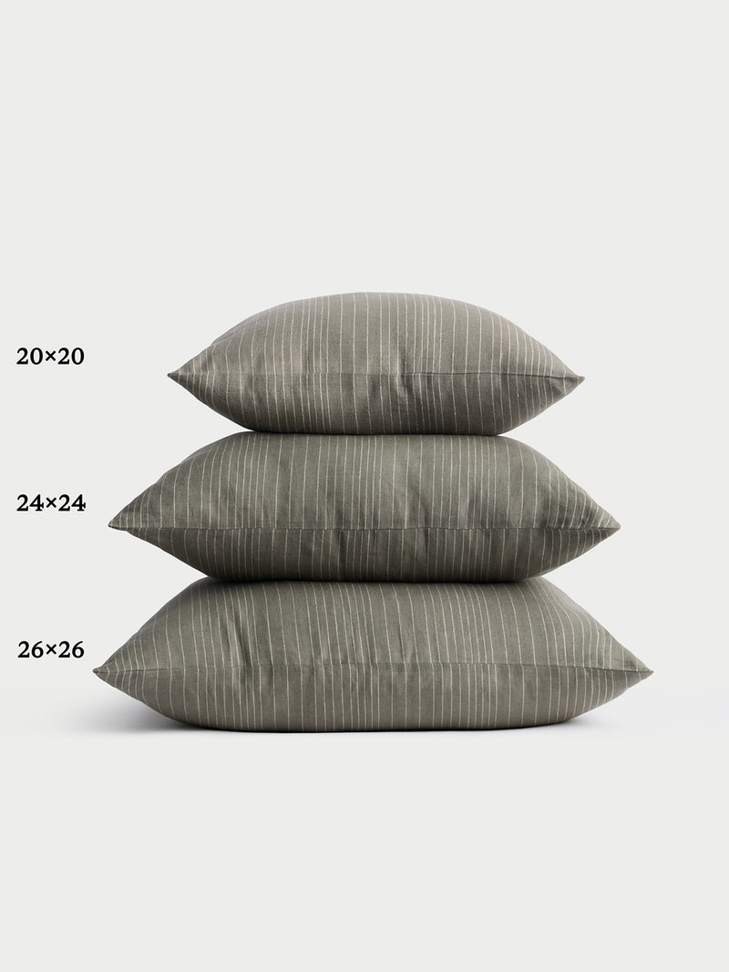 Cozy Earth striped throw pillow with plain white background