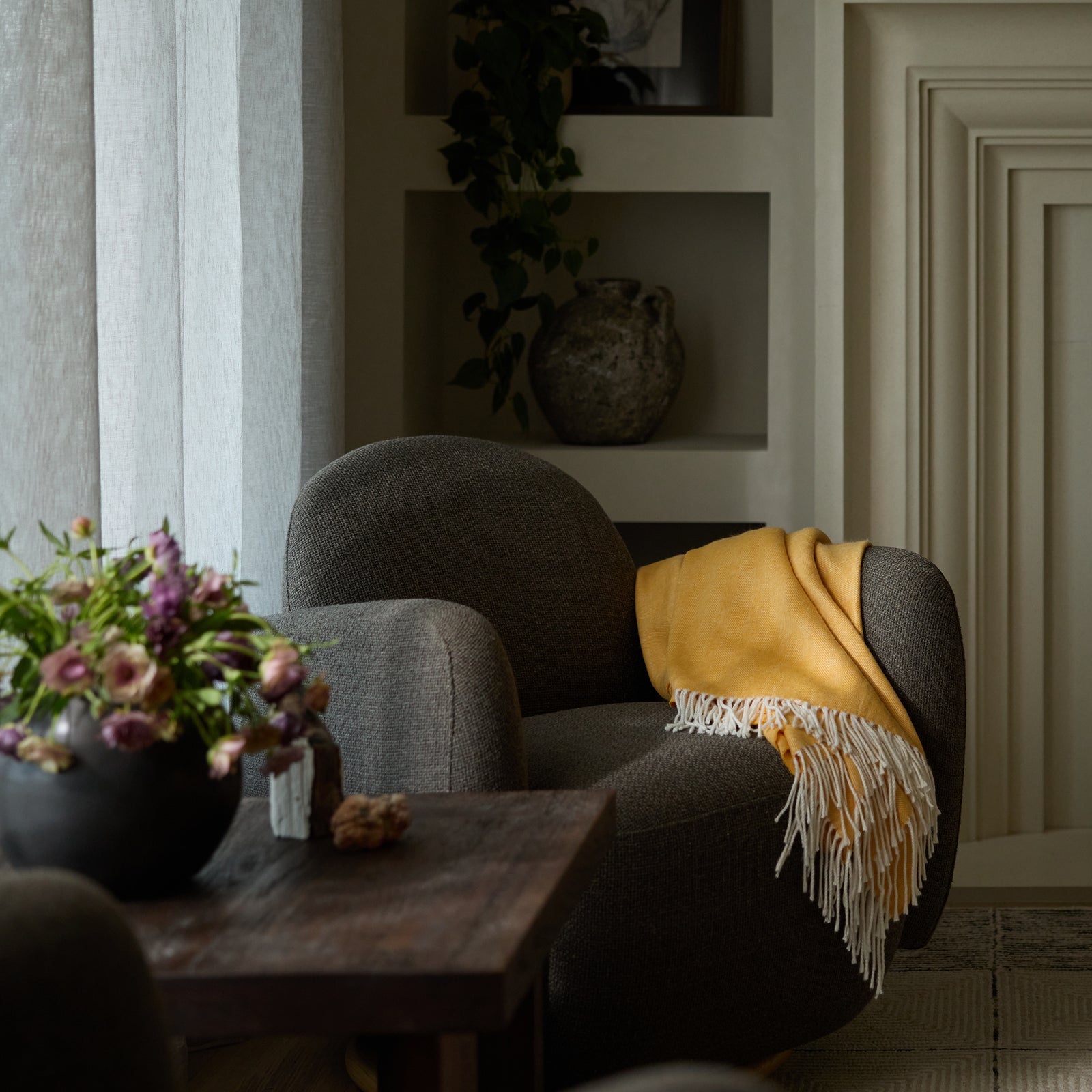 Living room featuring recliner with sunflower herringbone tassel throw 