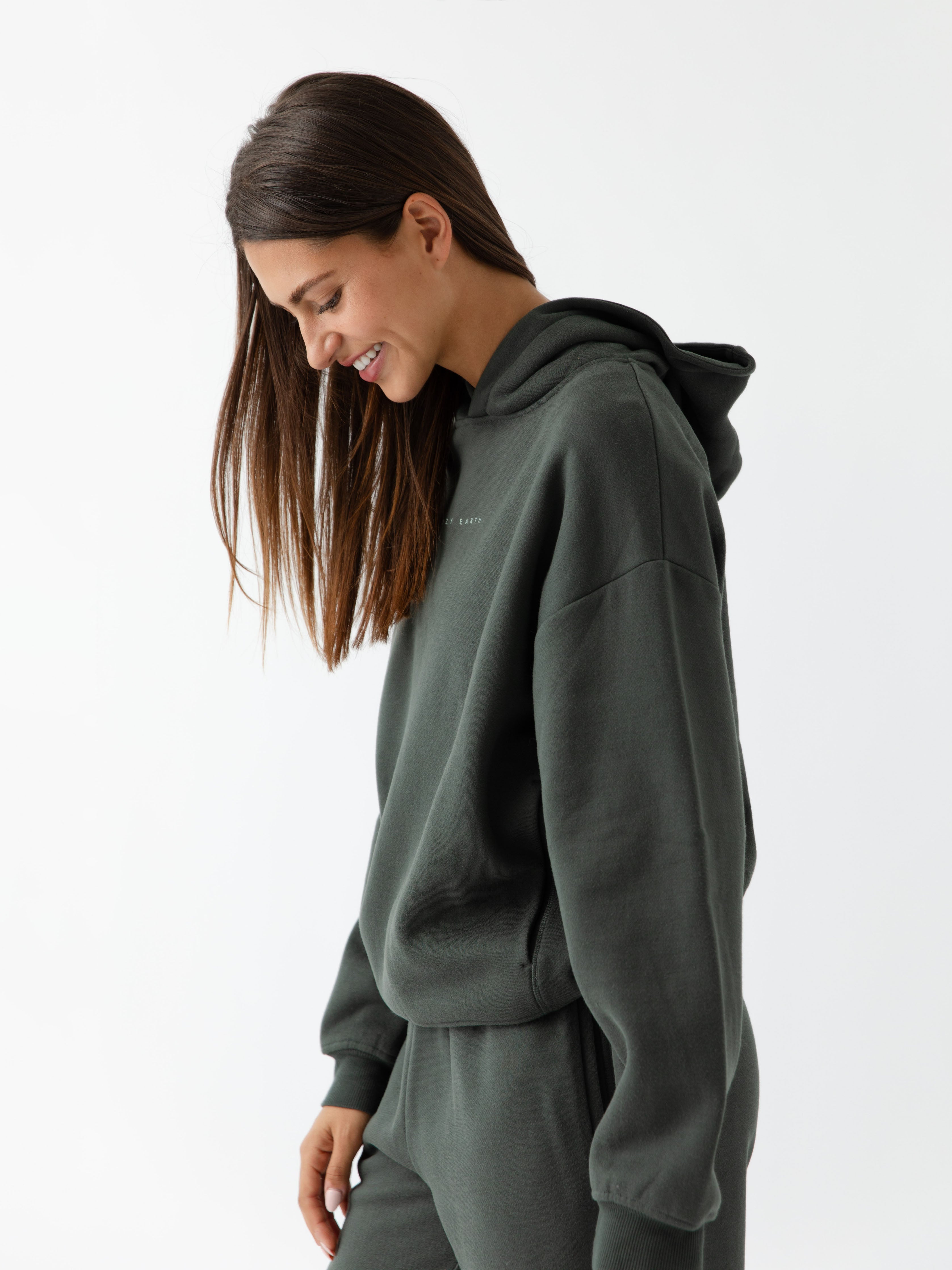 Side view of woman wearing storm cityscape hoodie |Color:Storm