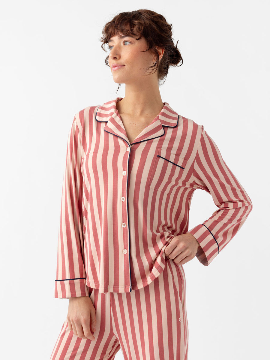 Waist up of woman wearing blush stripe pajamas with white background |Color:Blush Stripe