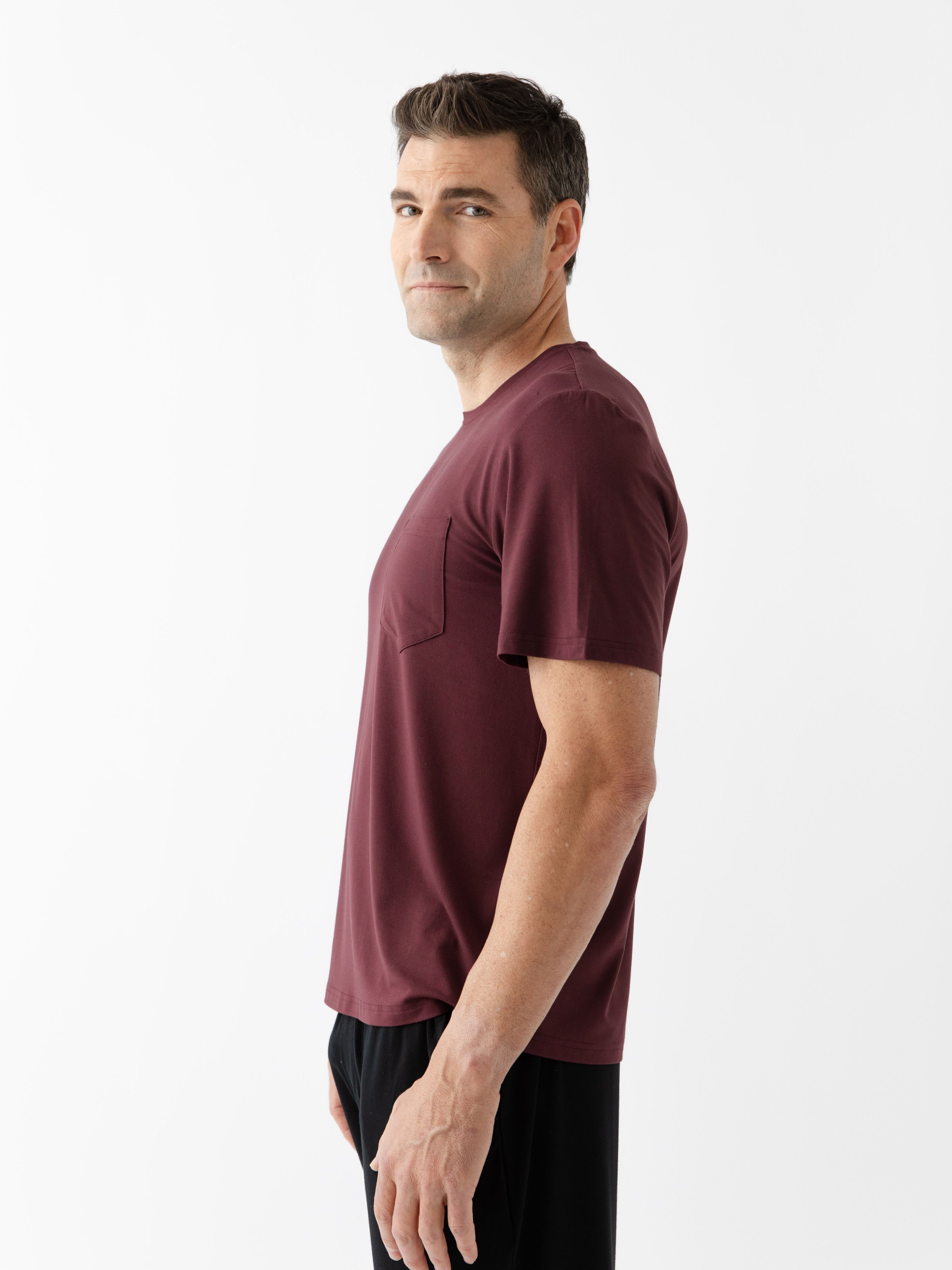 Burgundy Men's Stretch-Knit Bamboo Lounge Tee. A man is wearing the lounge tee in a well lit home.|Color:Burgundy