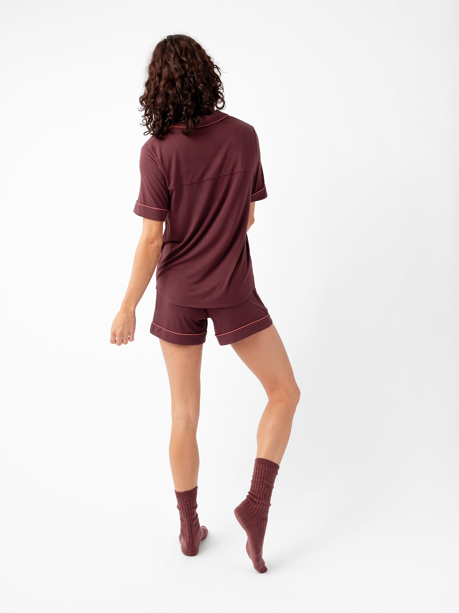 Woman wearing Women's Short Sleeve Bamboo Pajama Top in Stretch-Knit - Burgundy 