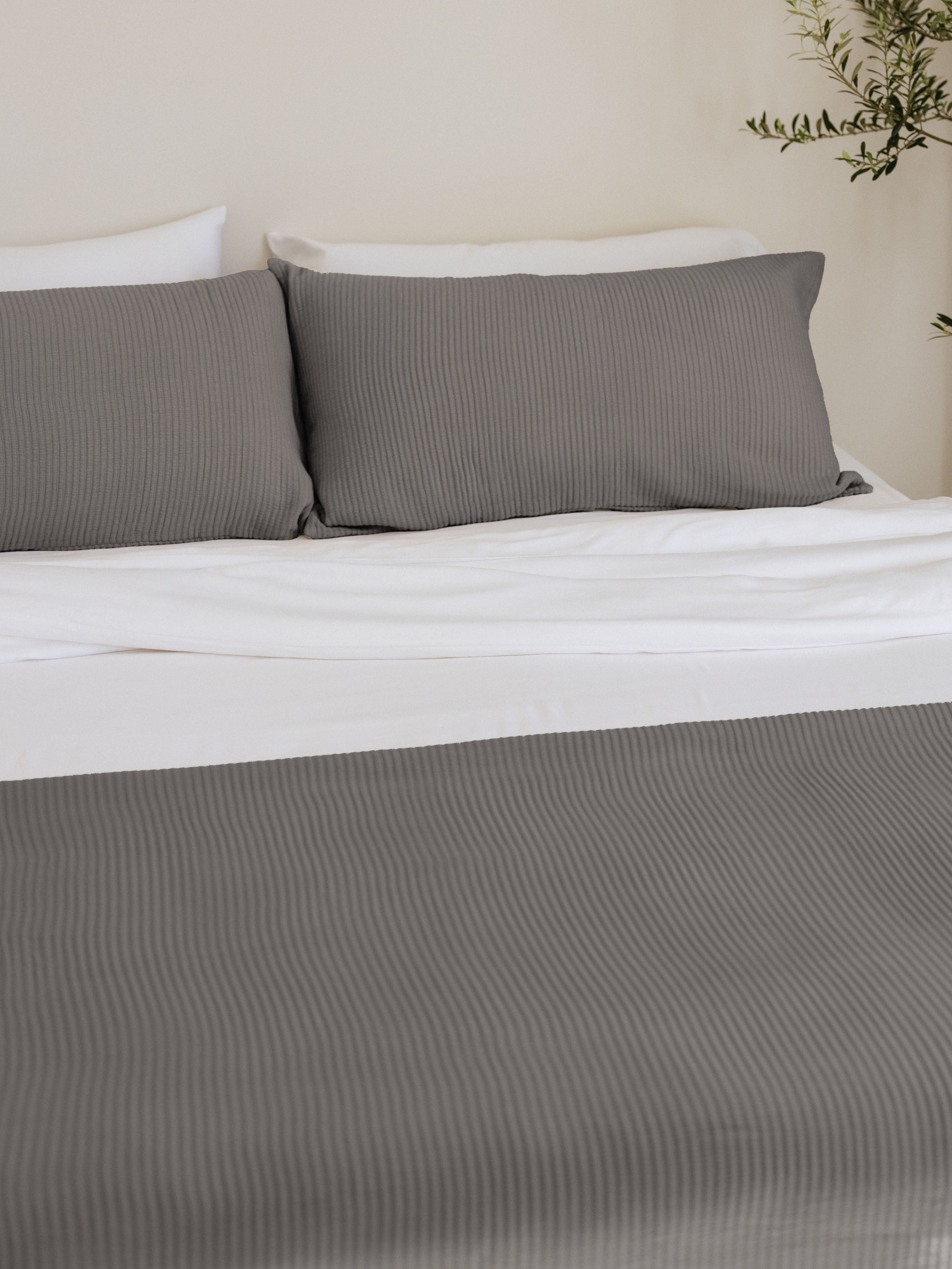 Charcoal shams and coverlet on a bed |Color:Charcoal