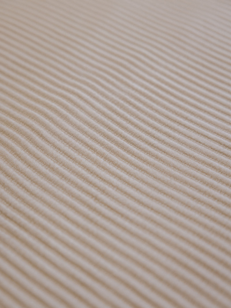 Close up of driftwood coverlet fabric