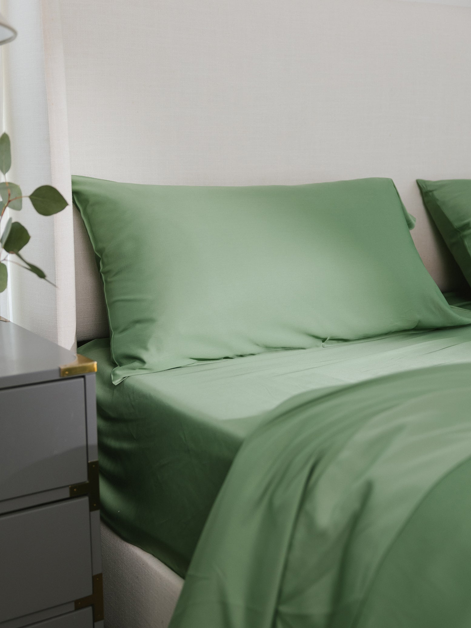 Fern Pillowcases on bed. Photo taken close up standard/king. 