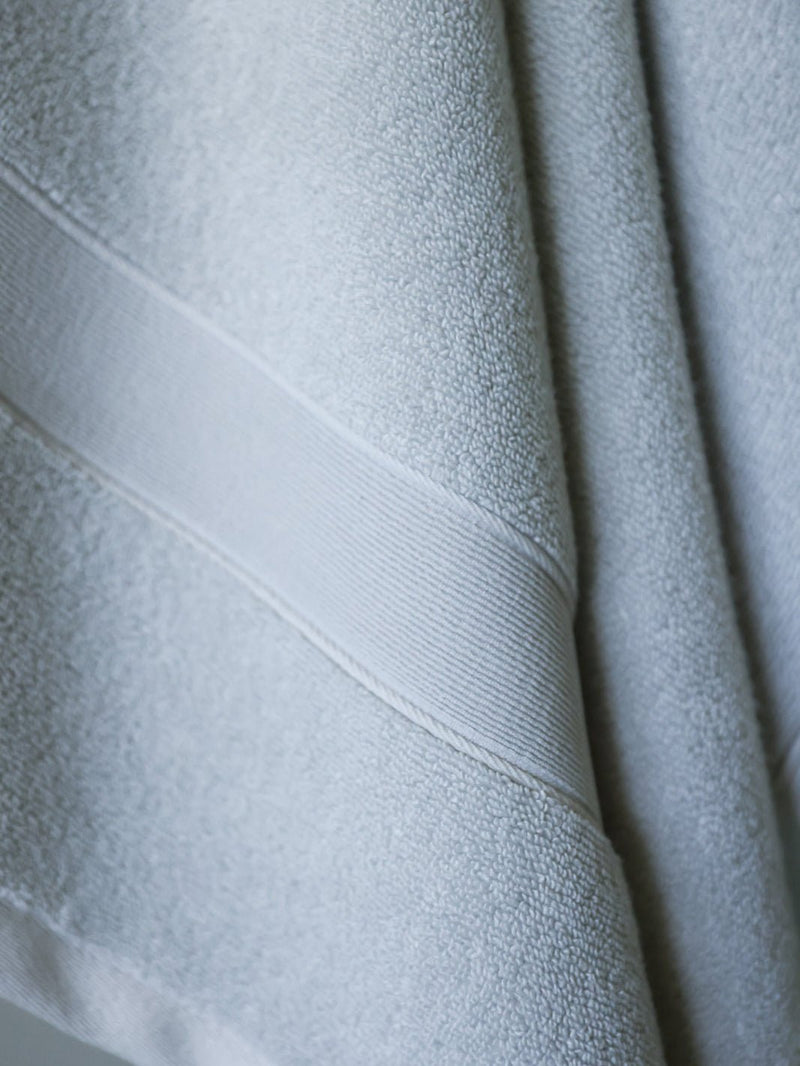 Close up of light grey luxe bath towel