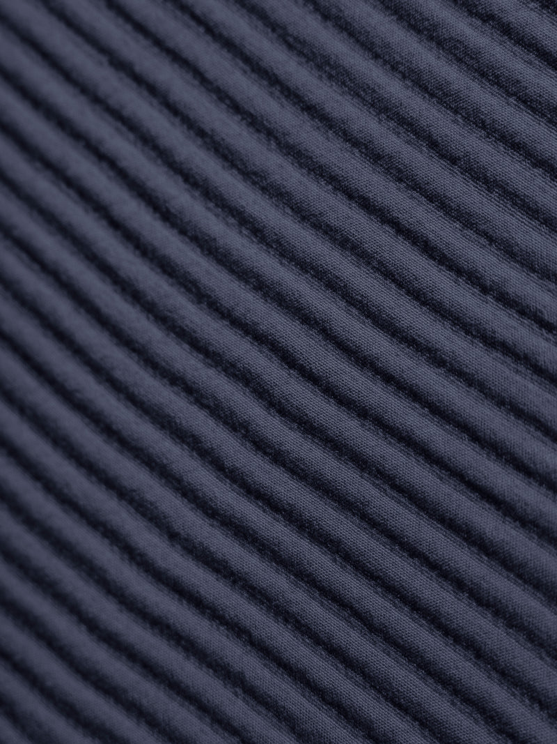 Close up of navy coverlet sham fabric