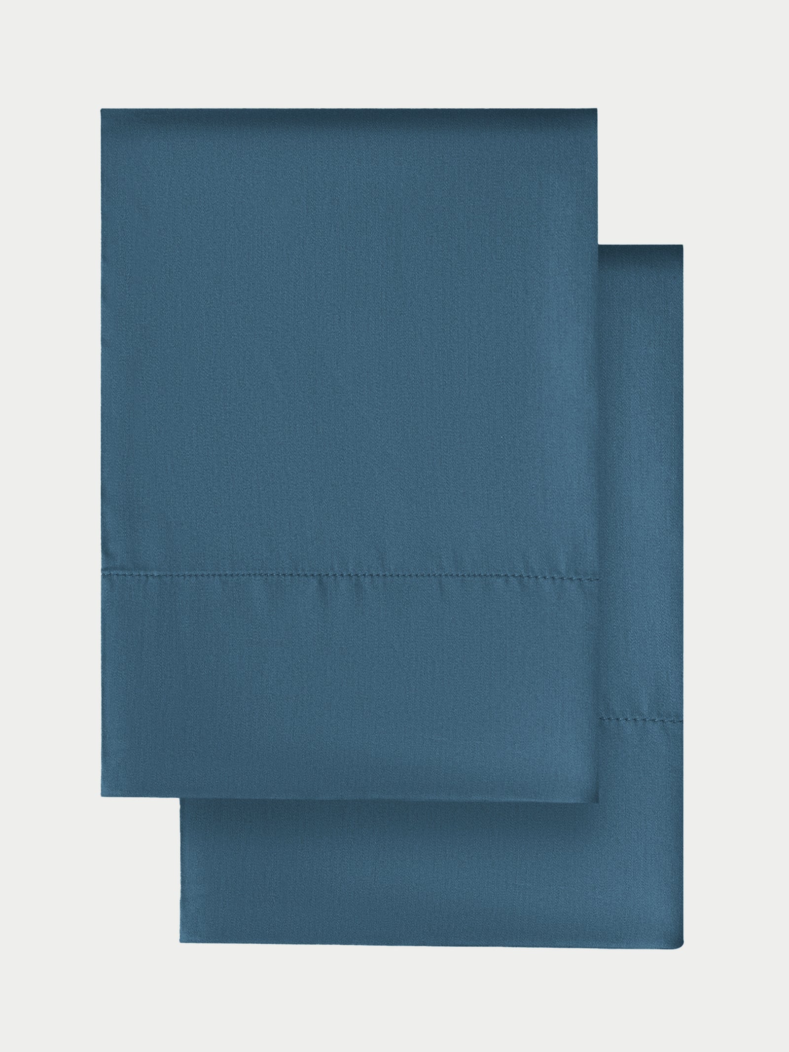 Flat lay of two pillowcases in pacific blue standard/king/body