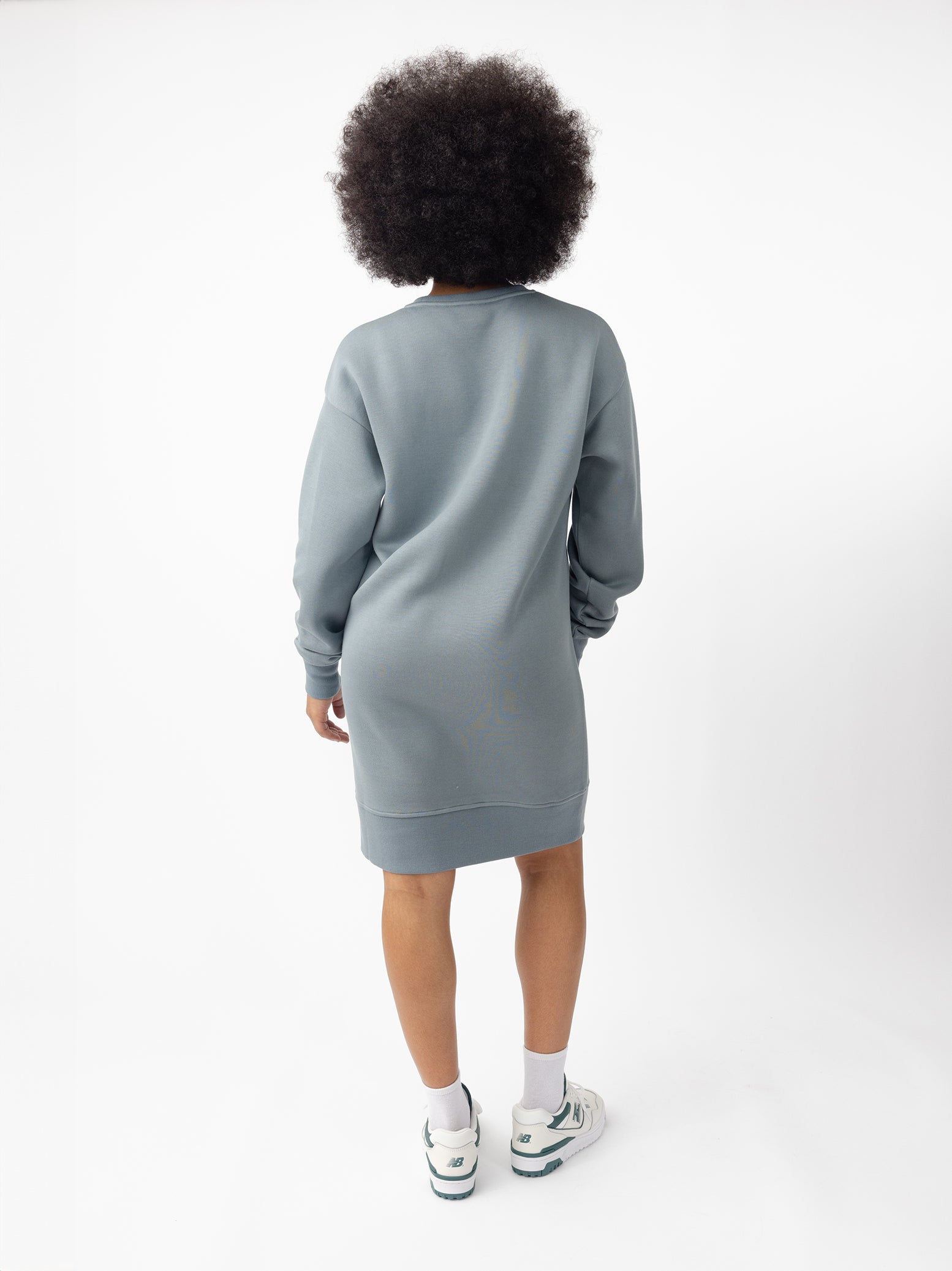 Woman wearing Smokey Blue CityScape Crewneck Dress with white background 