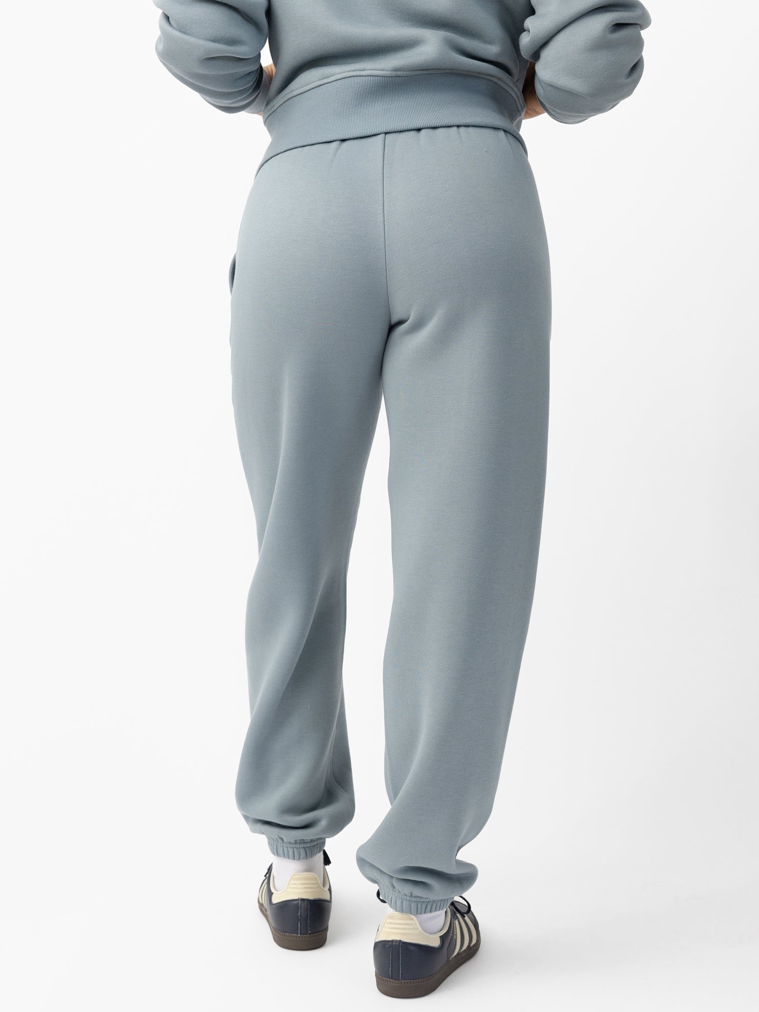 Woman wearing Smokey Blue CityScape Sweat Pant with white background 