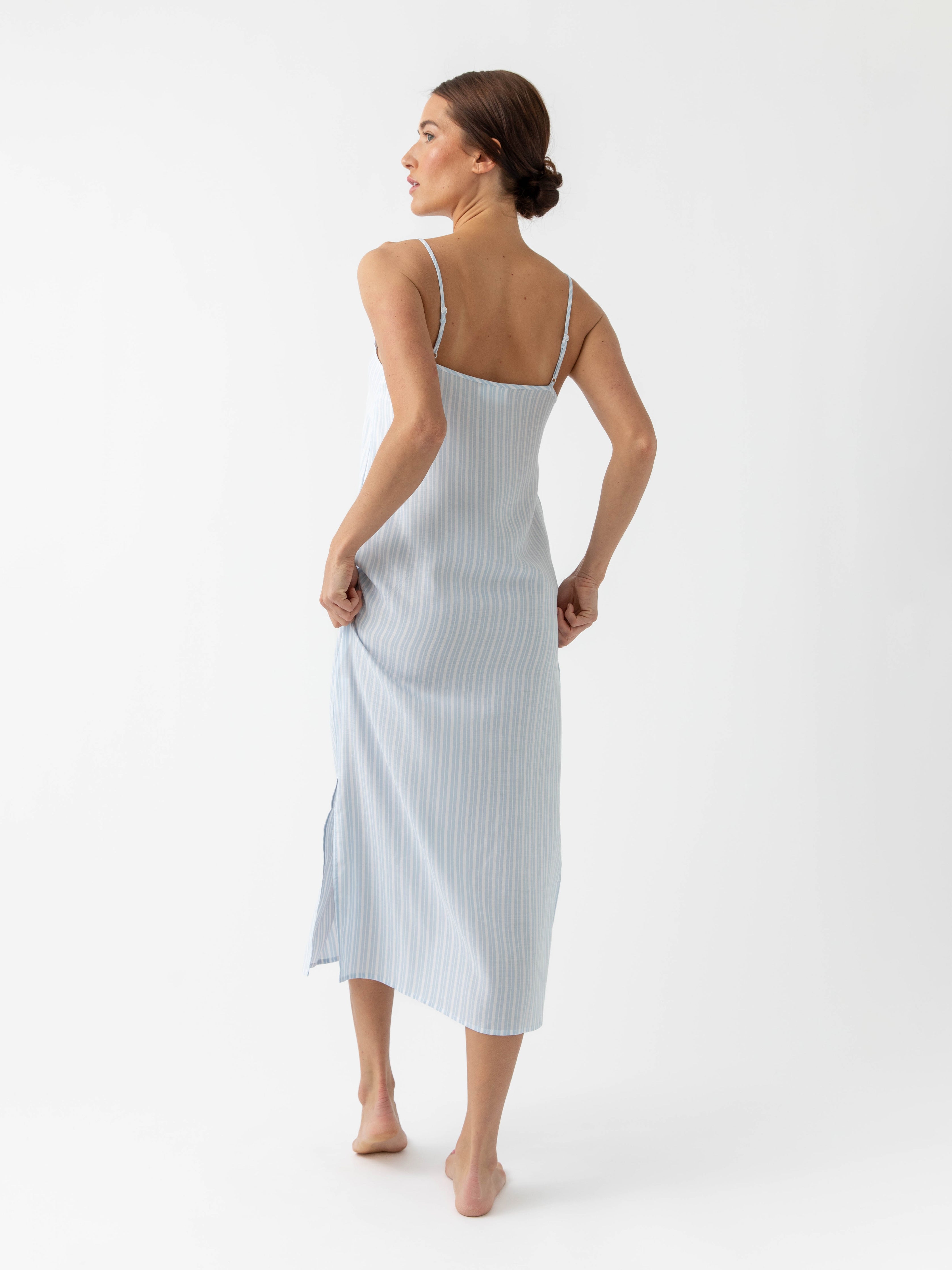 Woman in Spring Blue Stripe nightgown standing in front of white background |Color:Spring Blue Stripe