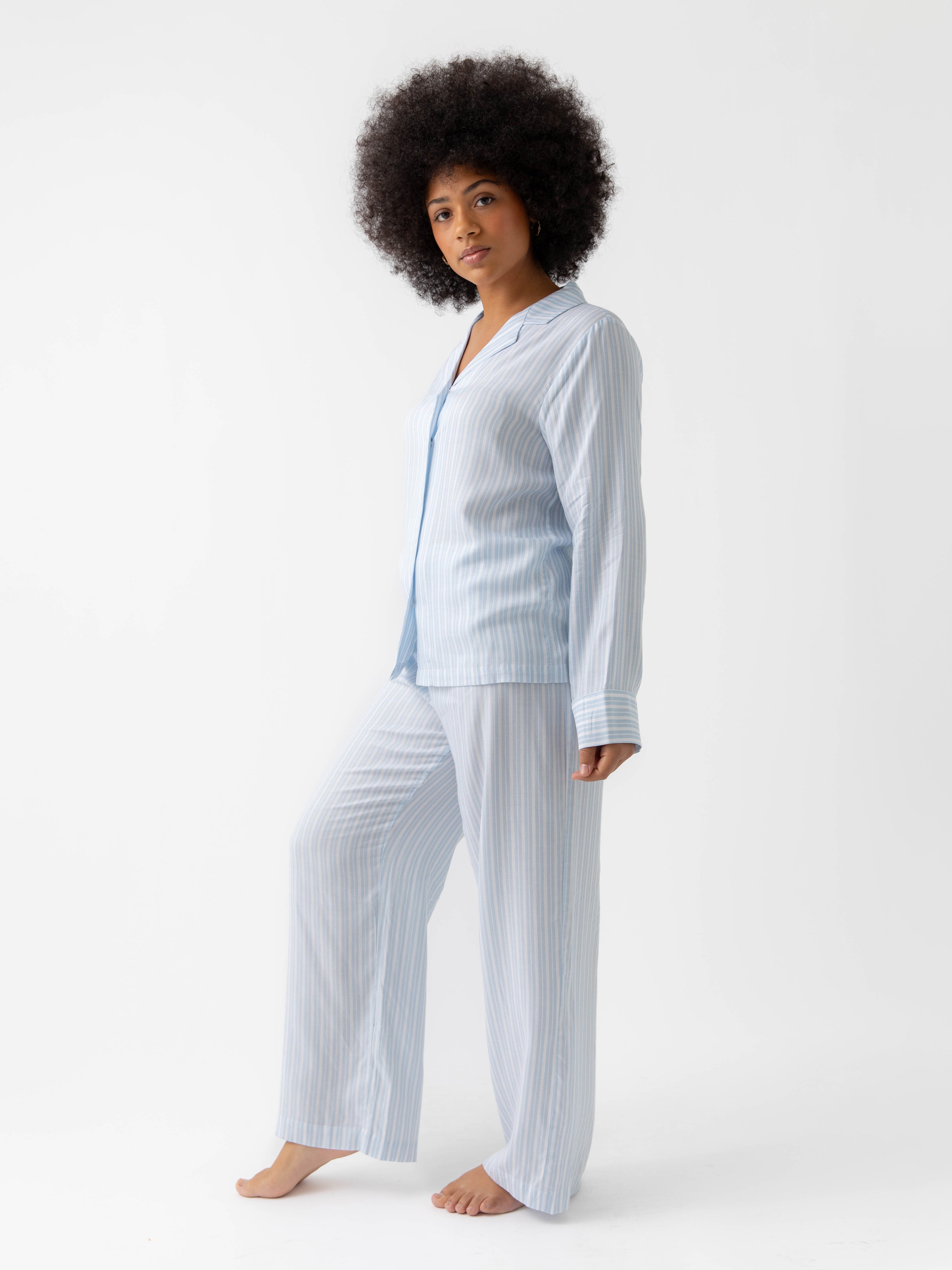 Woman wearing Spring Blue Stripe soft woven pajamas with white background |Color:Spring Blue Stripe