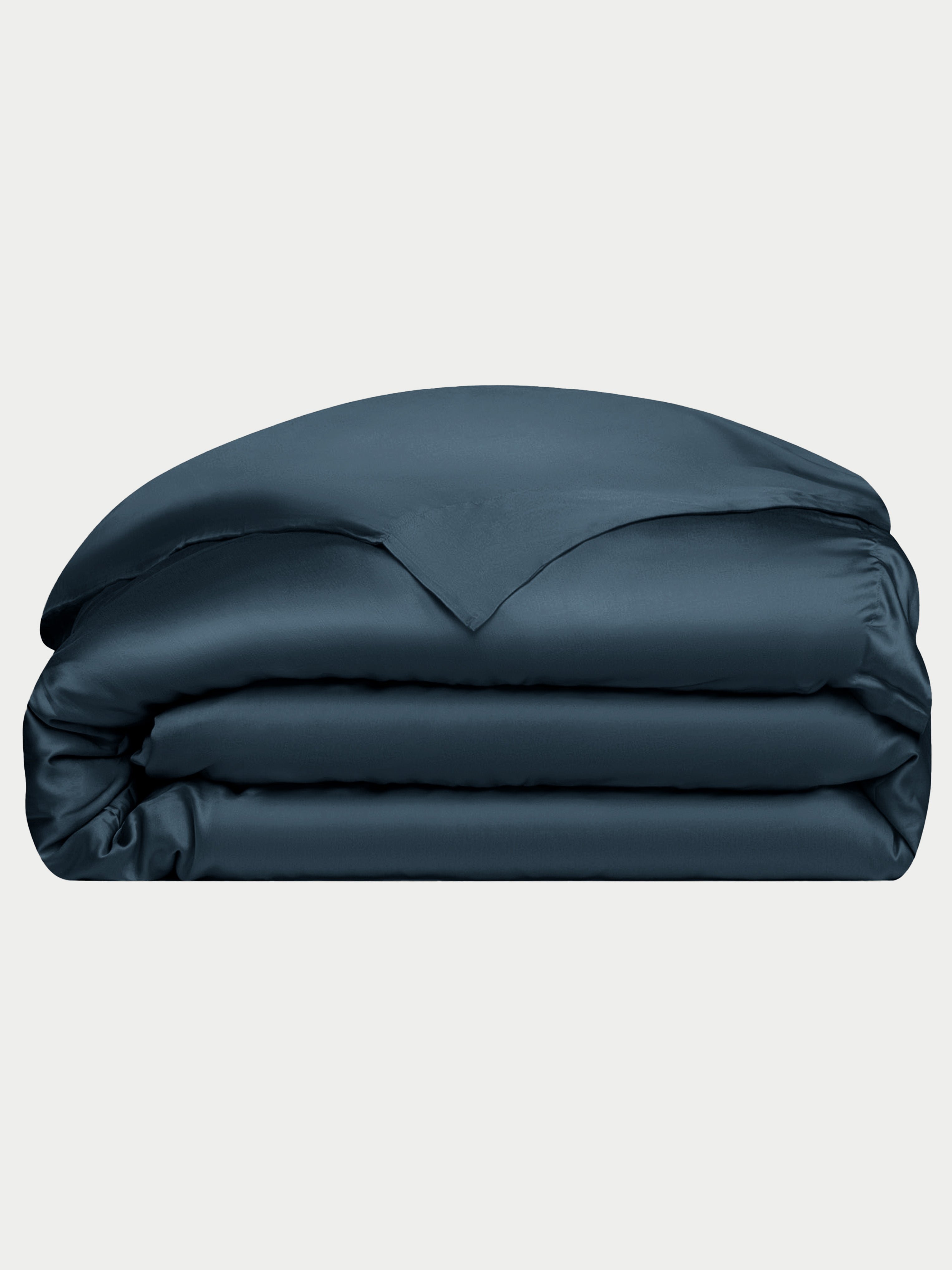 Navy duvet cover folded with white background 