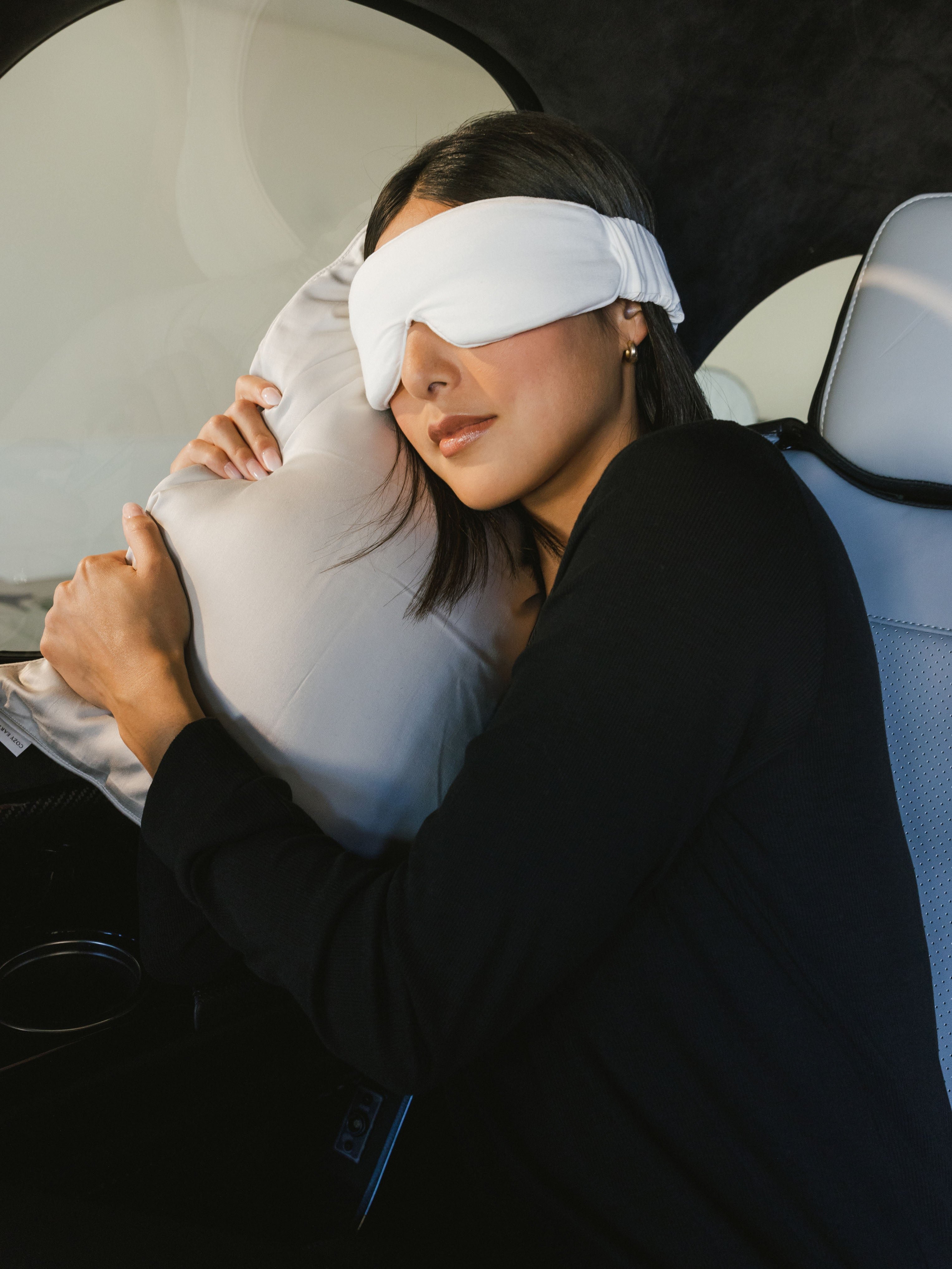 Woman with face mask in airplane using travel pillow |Size:Travel