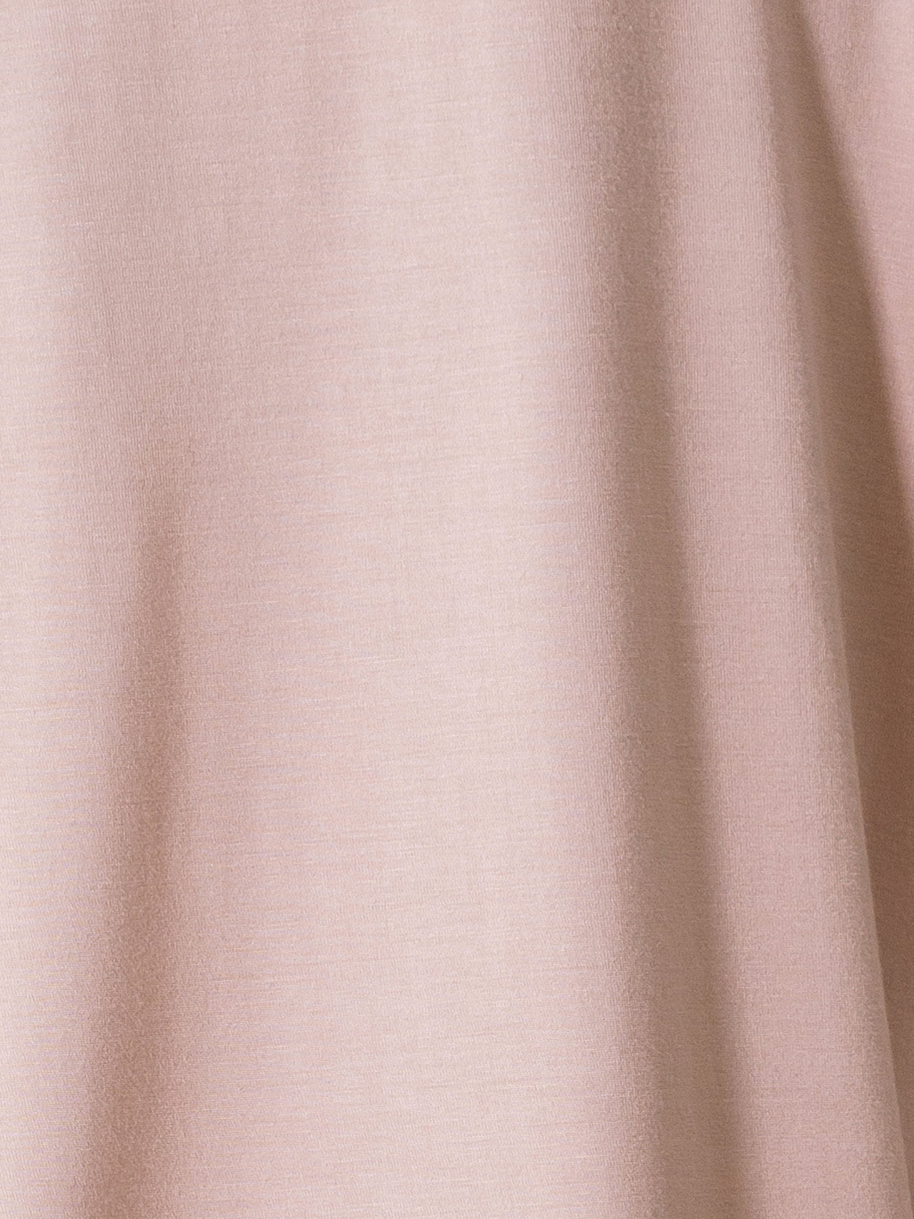 Blush Short Sleeve Pajama Set. The photo was taken close up, showing off the print of the pajamas. 
