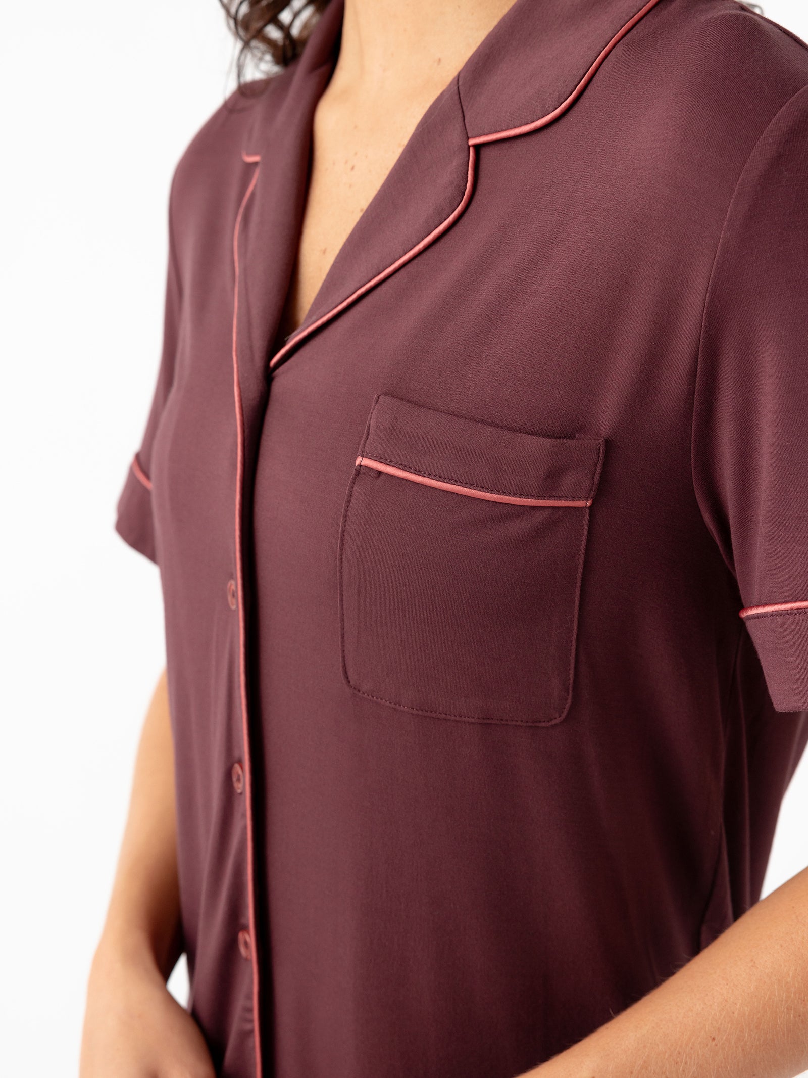 Woman wearing Women's Short Sleeve Bamboo Pajama Top in Stretch-Knit - Burgundy 