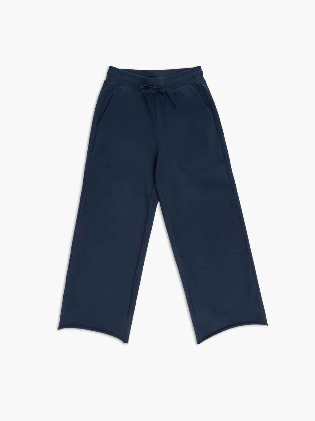 Cozy Earth's Women's Chelsea Cropped Pant in dark blue features wide legs, an elastic waistband with a drawstring, side pockets, and a relaxed fit, displayed on a light background. |Color:Eclipse