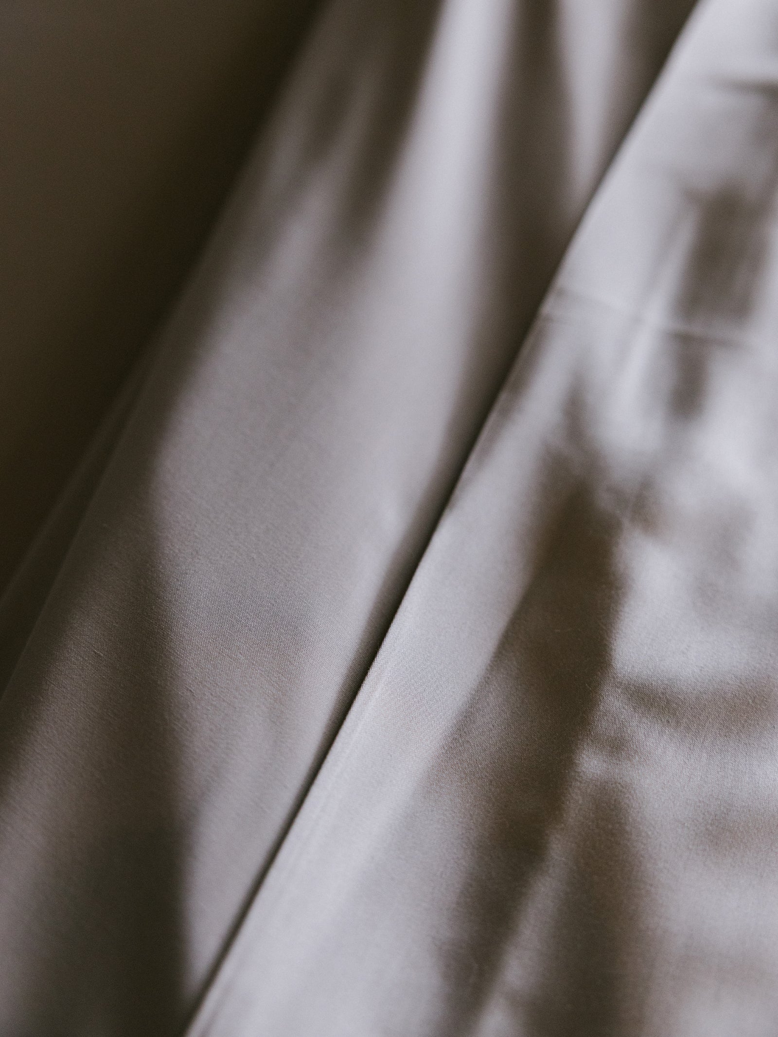 Close up of dove grey sheets 