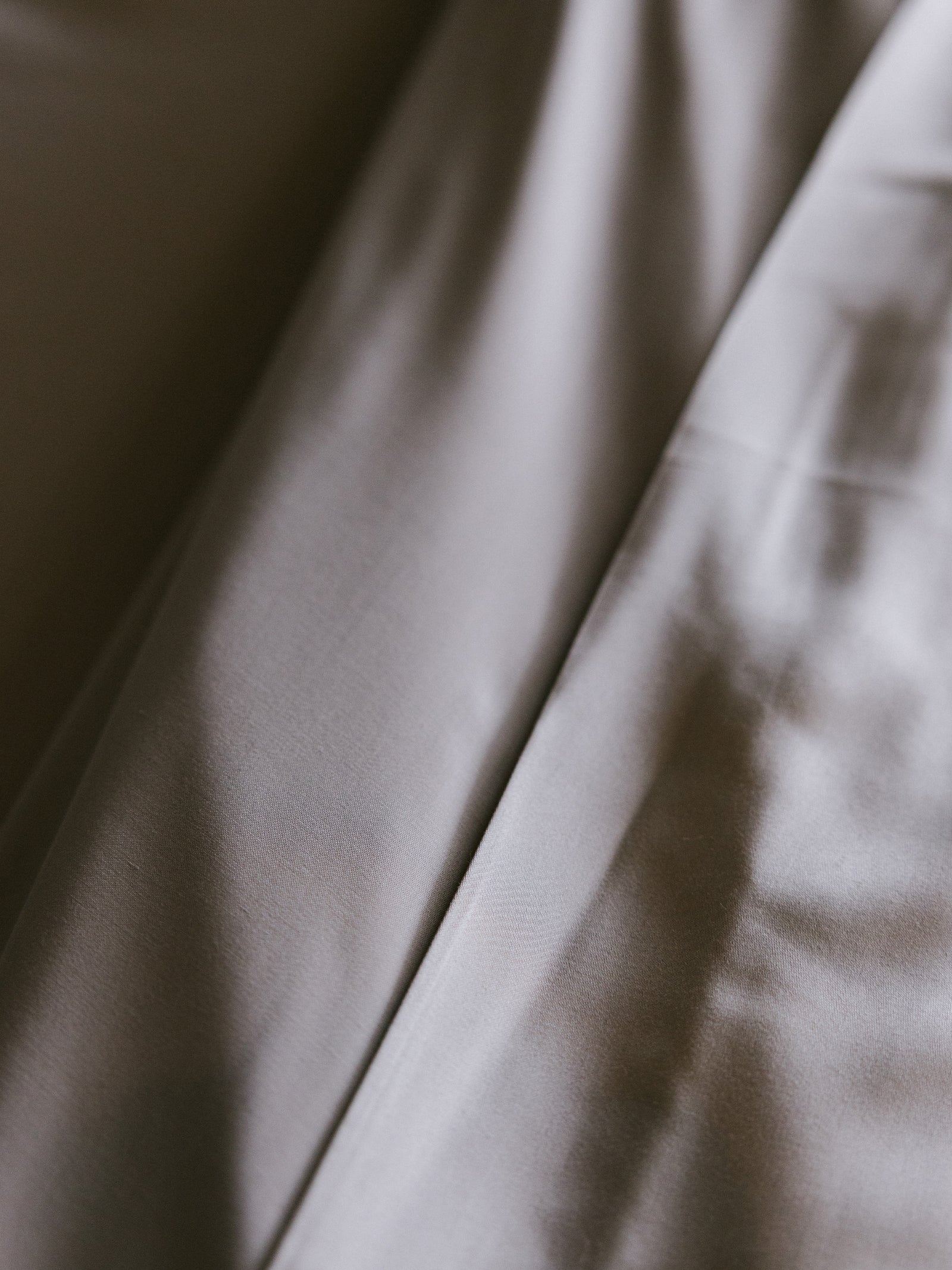Close up of dove grey bedding standard/king/body