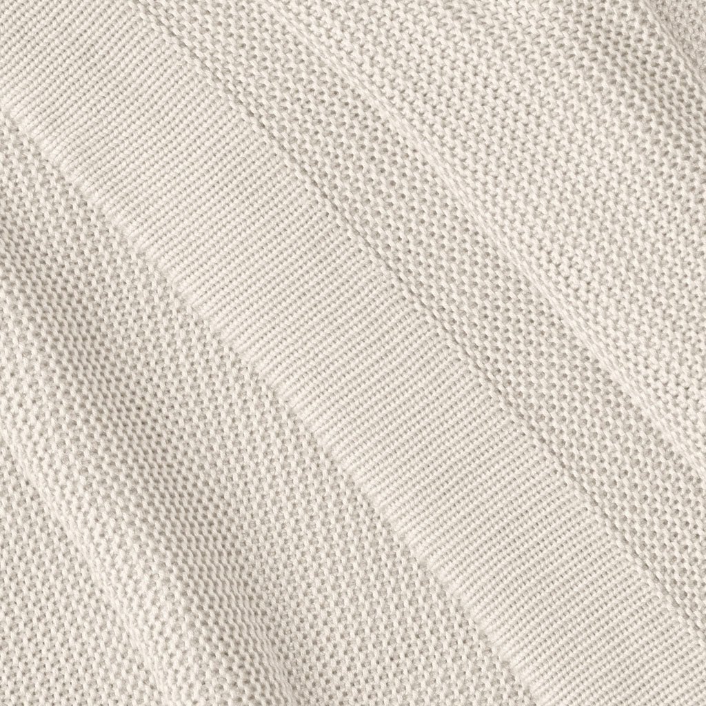 Close up of driftwood cloud knit blanket 