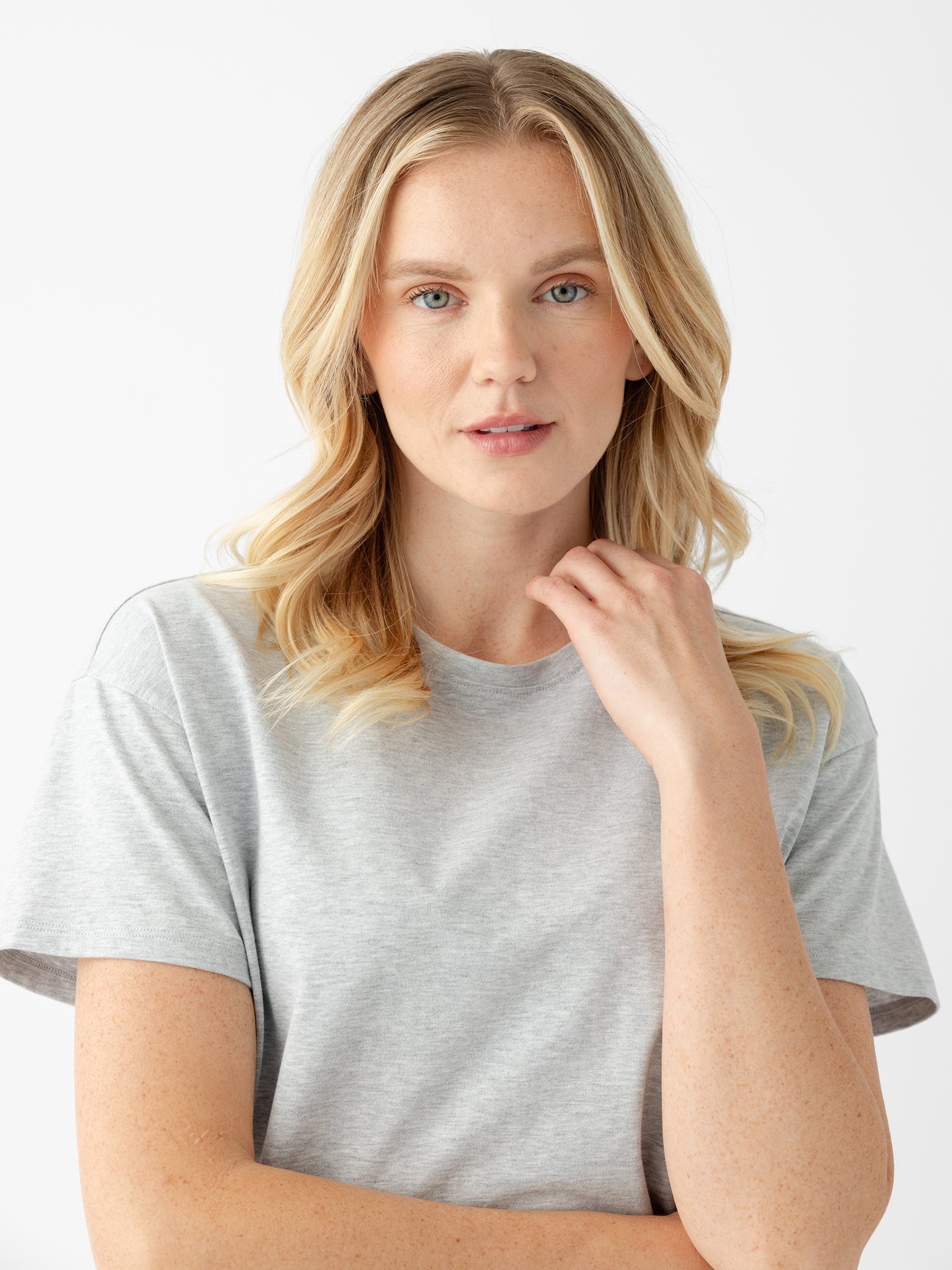 Close up of woman wearing french dove heather tee |Color:French Dove Heather