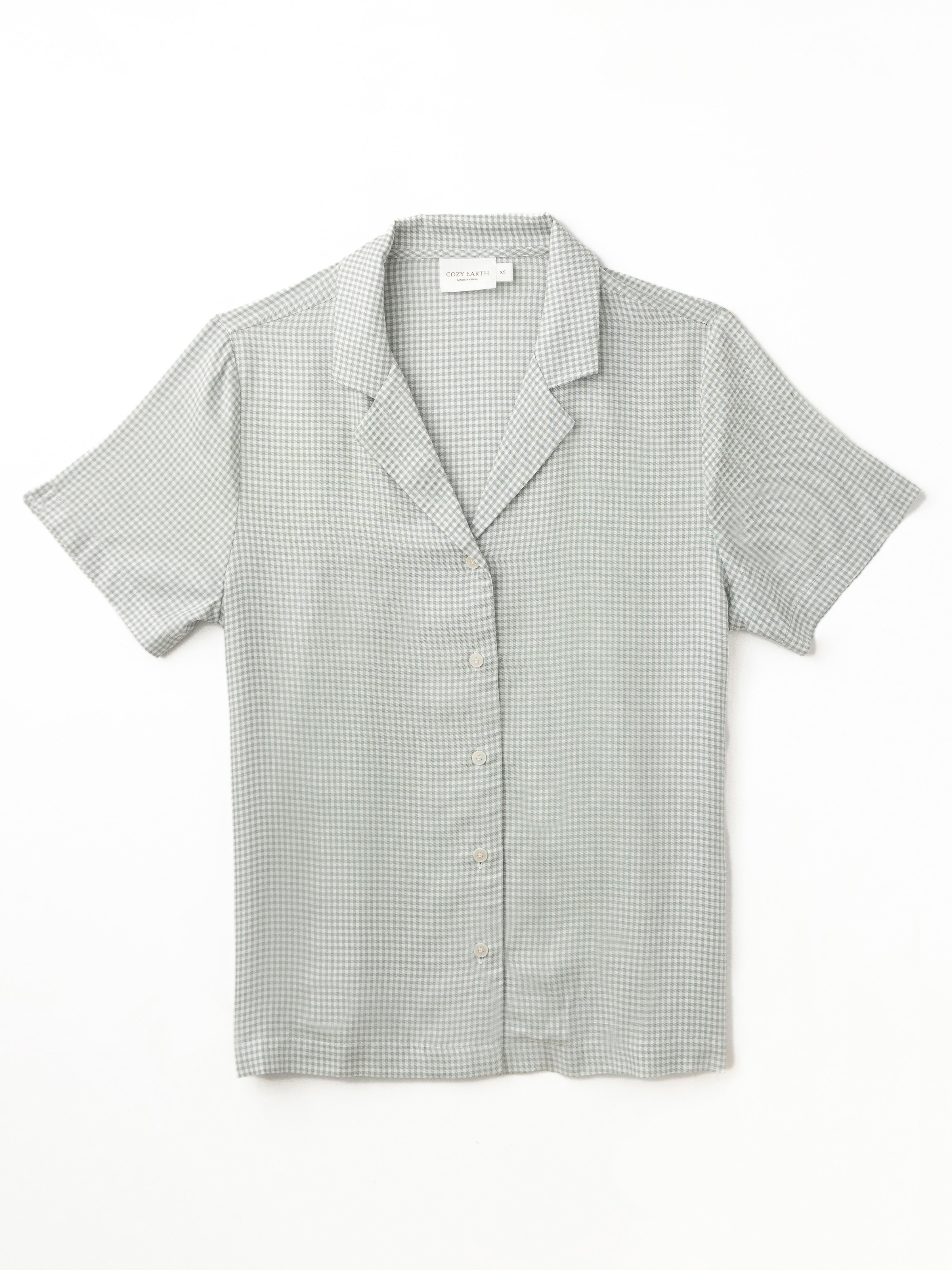 Flat lay of haze mini gingham pajama top with white background 